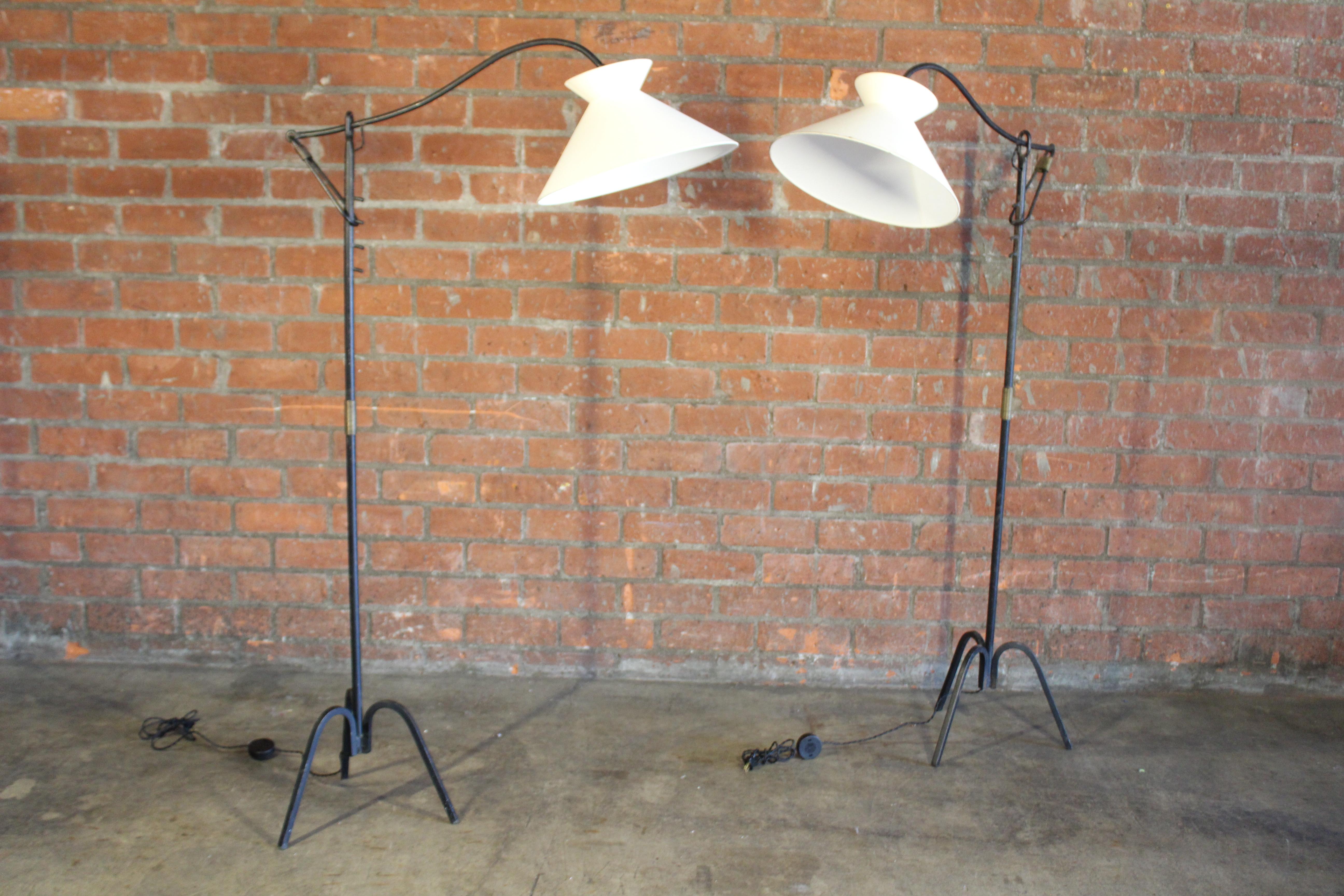 Mid-Century Modern Adjustable Iron Floor Lamp Attributed to Jacques Adnet, France, 1950s. One Avail For Sale