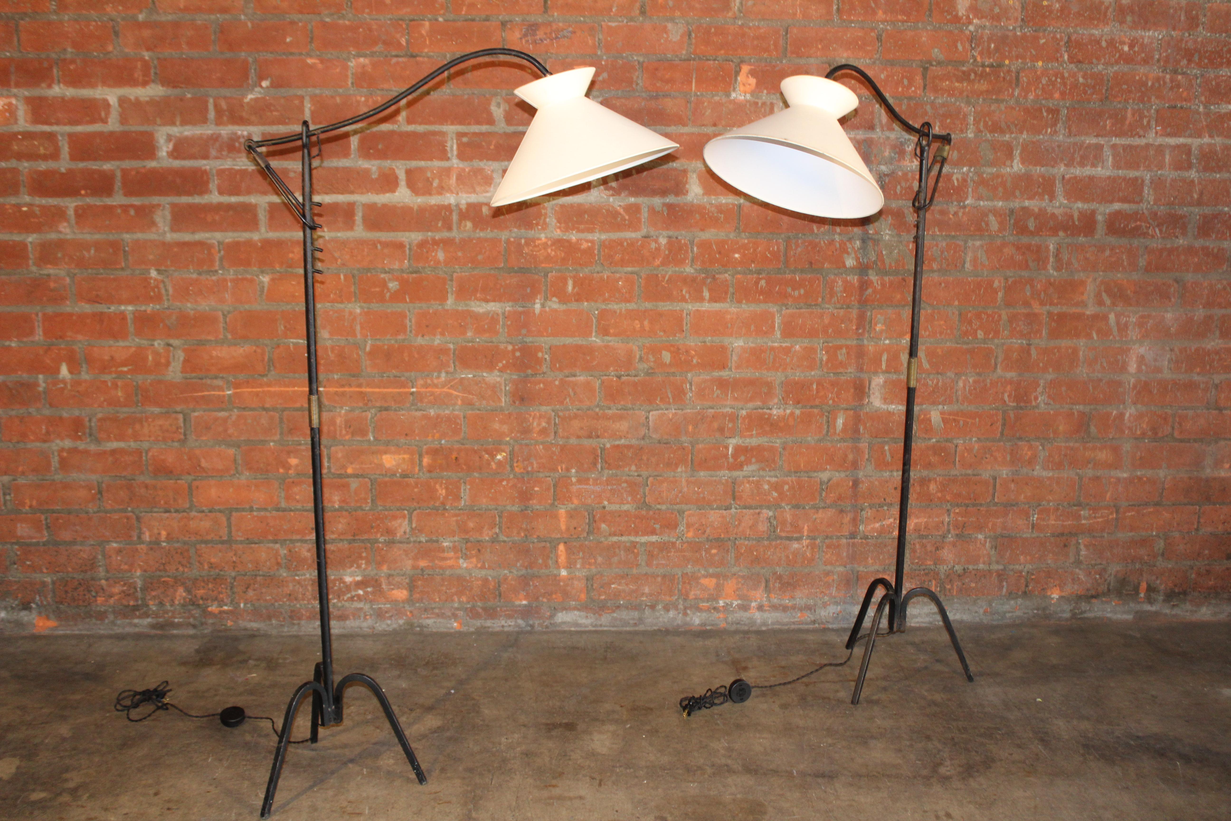 French Adjustable Iron Floor Lamp Attributed to Jacques Adnet, France, 1950s. One Avail For Sale