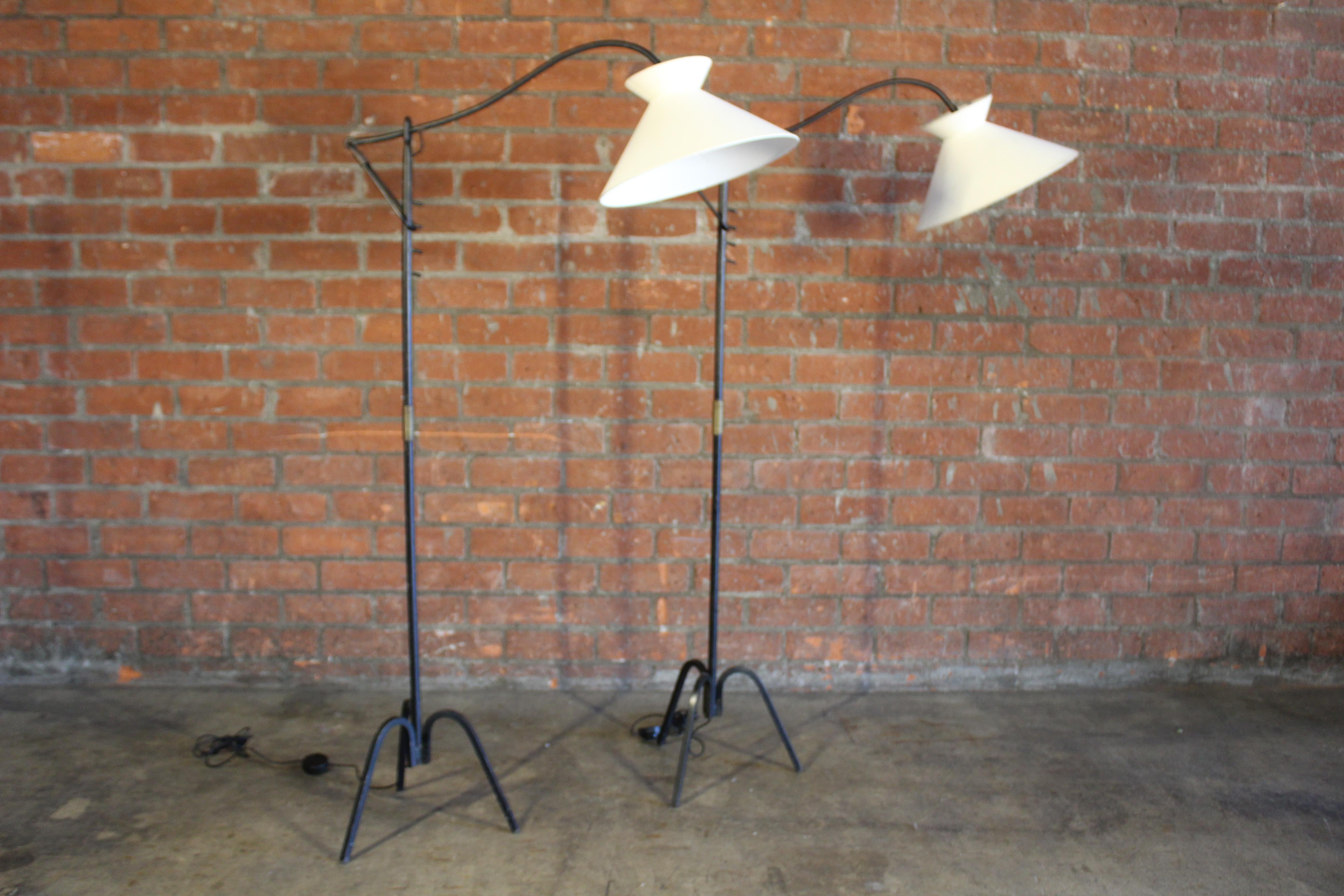 Mid-20th Century Adjustable Iron Floor Lamp Attributed to Jacques Adnet, France, 1950s. One Avail For Sale