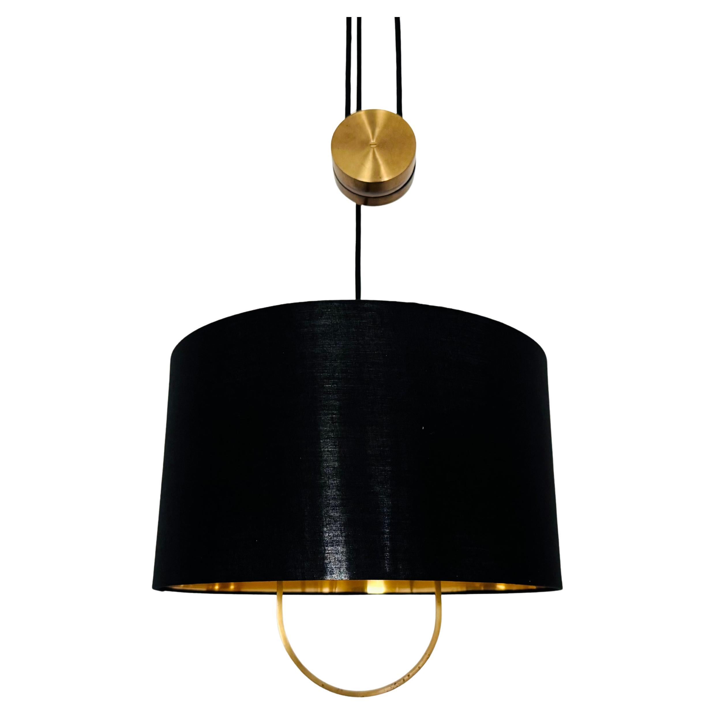 Adjustable Jo-Jo Pendant Lamp by Florian Schulz in vendita