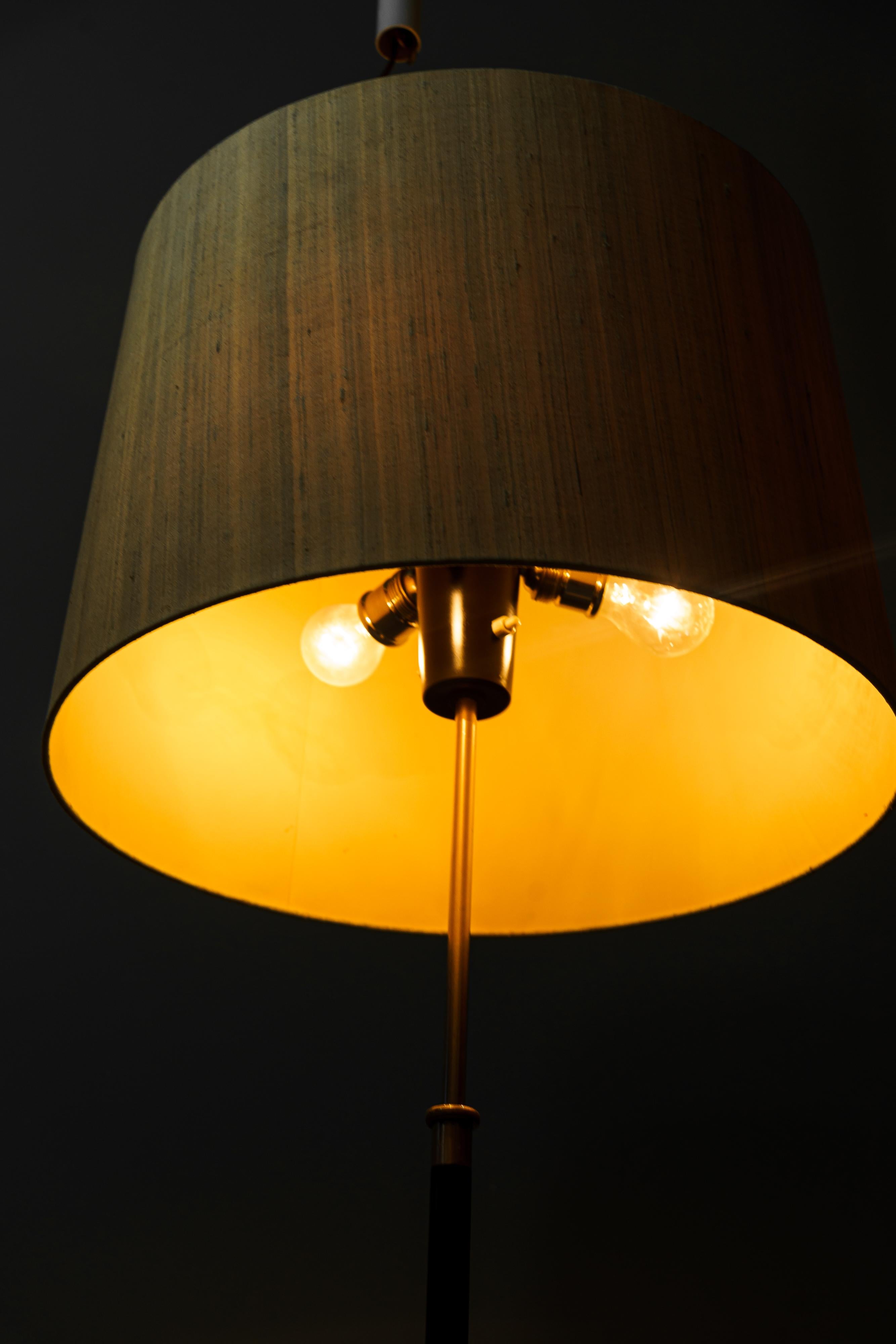 Mid-20th Century Adjustable J.T.Kalmar Floor Lamp Vienna Around 1950s with Fabric Shade For Sale