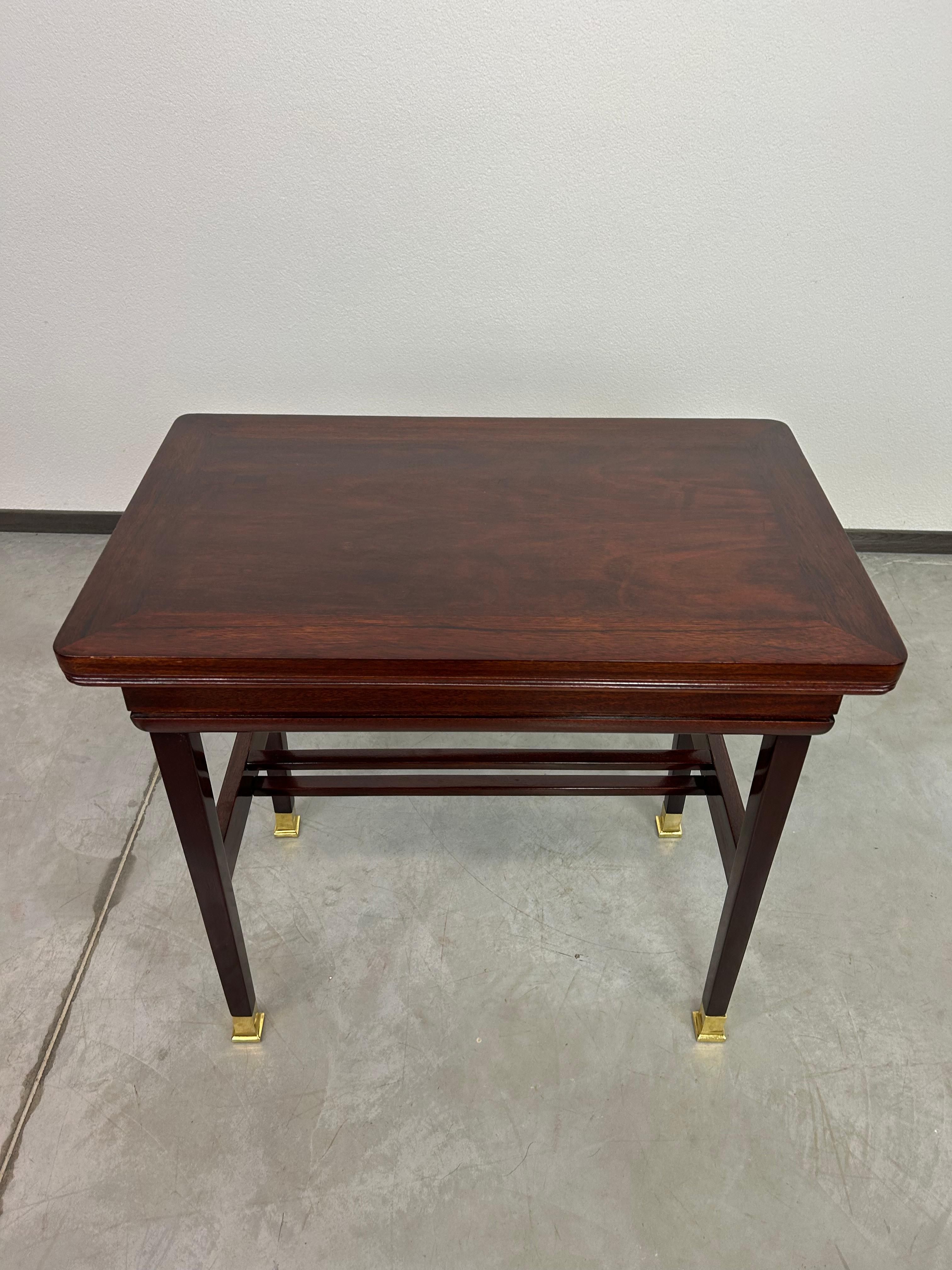 Adjustable jugendstil game table with brass leg endings by Portois & Fix. Professionally stained and repolished.