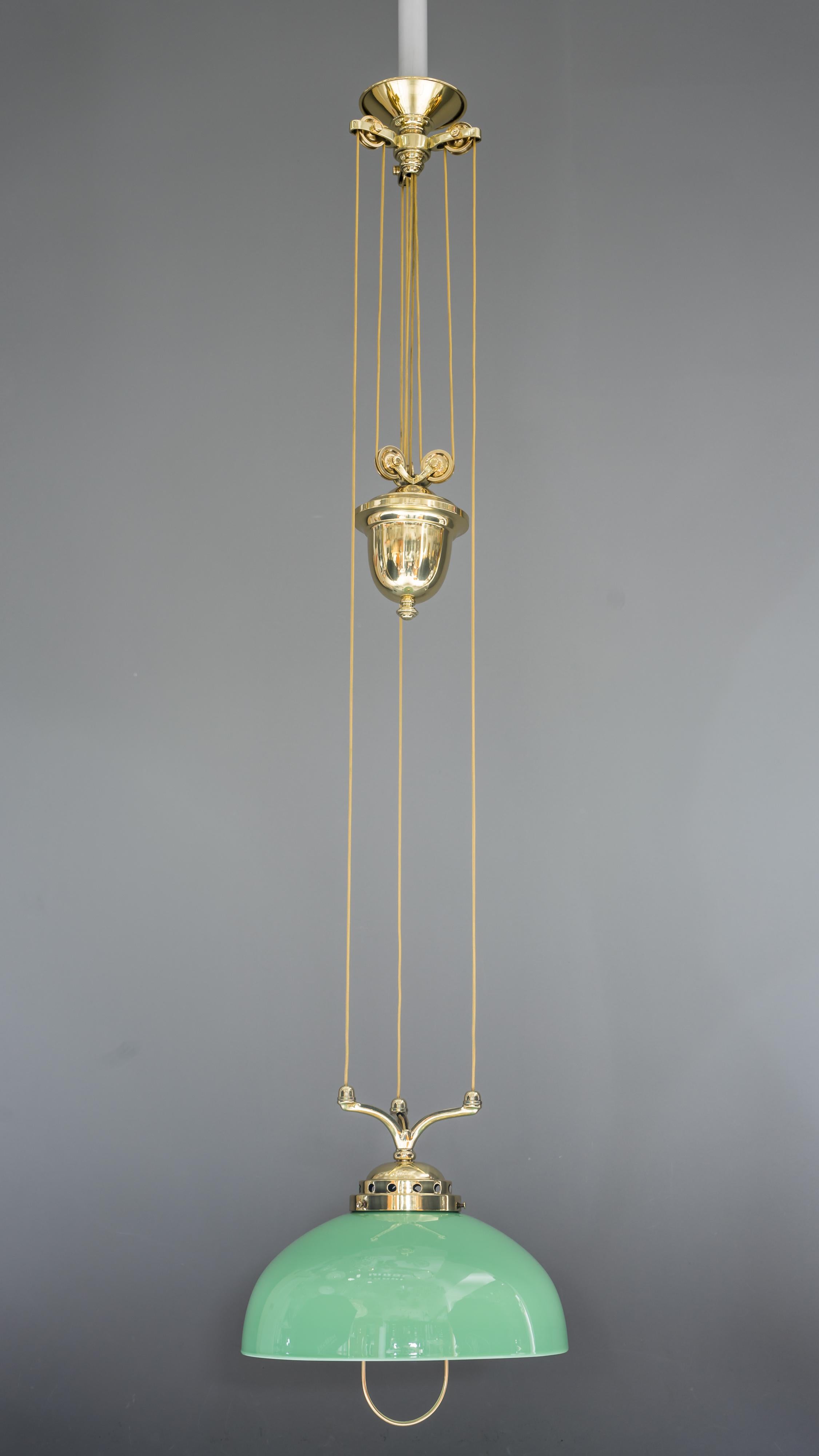 Adjustable jugendstil chandelier with green opal glass
Polished and stove enameled
Measures: The high is adjustable from 97cm-195cm
Wide is 31cm
New wiring.