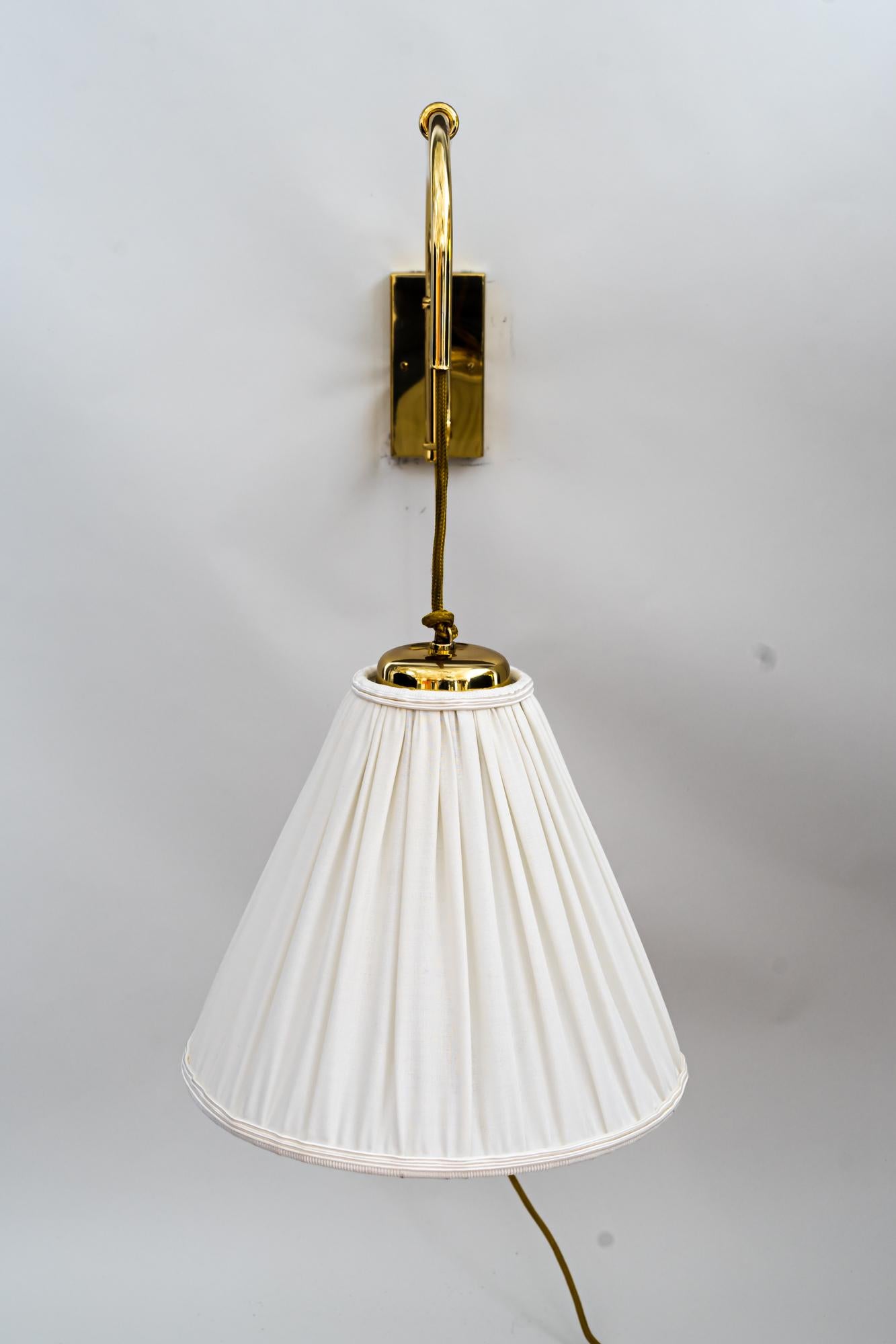 Adjustable kalmar wall lamp with fabric shade around 1950s
Adjustable from 80cm - 113cm
Original condition
Shade is replaced ( new ).