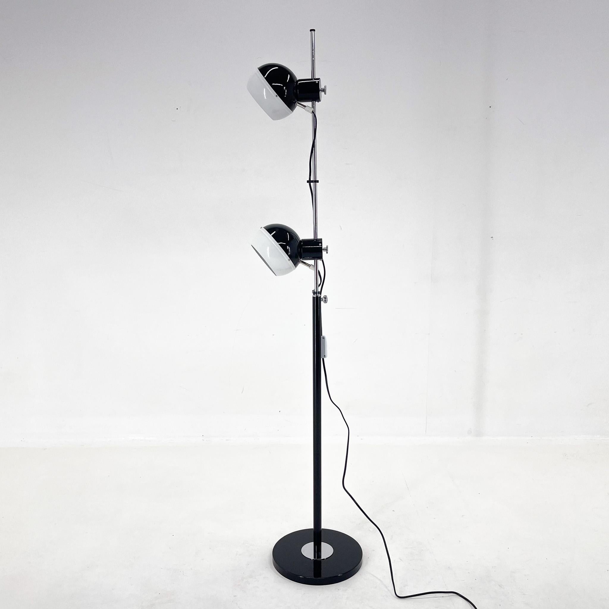 Black and white floor lamp made of chrome and metal by Drukov in the former Czechoslovakia in the 1970s. The shades are adjustable in all directions and held in place by a magnet.  Completely restored, rewired.
2x40W, E25-E27 bulbs.
US plug adapter