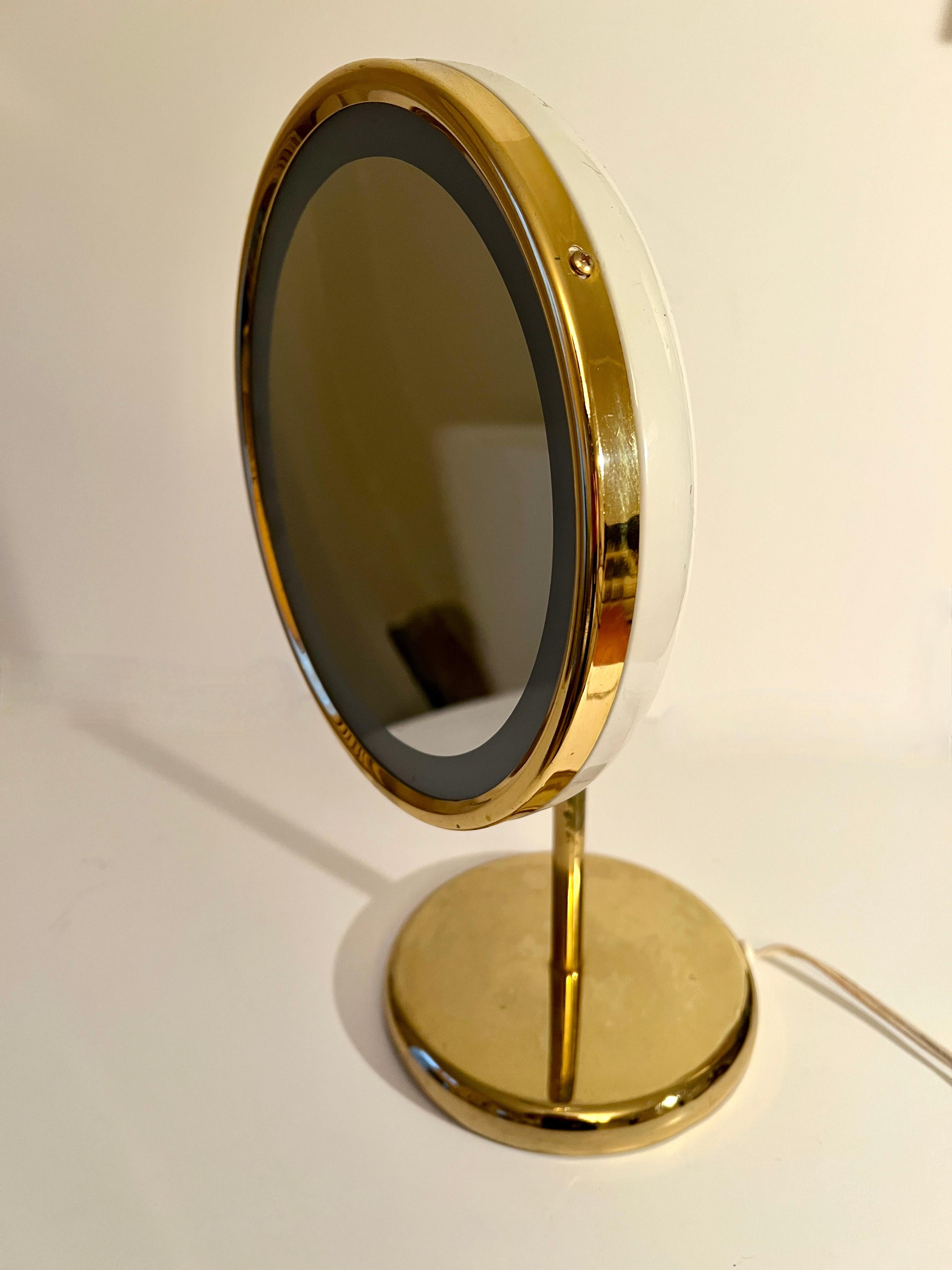 Metal Adjustable Magnifying Ring Lit Table Mirror on Brass Stand with Brass Details For Sale