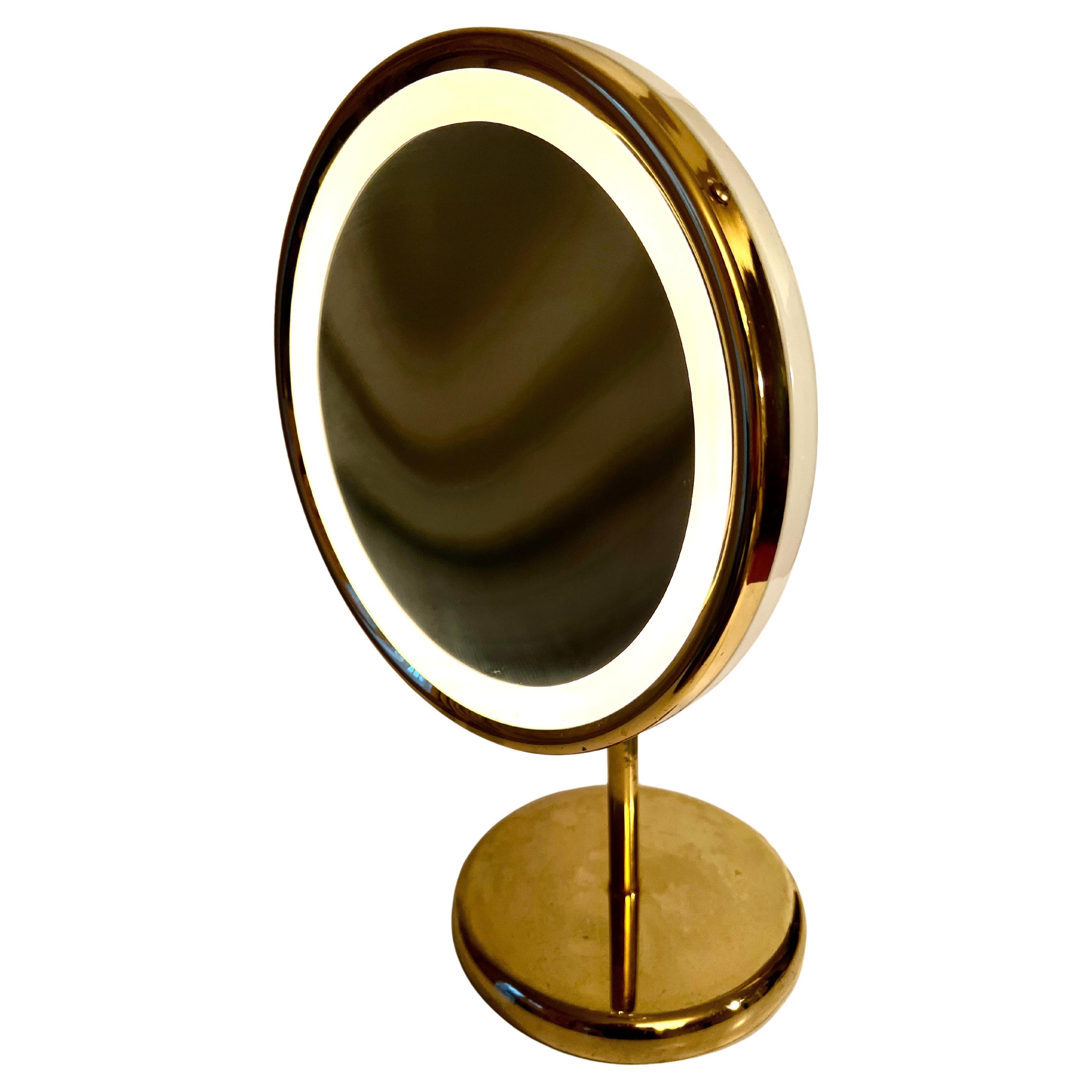 Adjustable Magnifying Ring Lit Table Mirror on Brass Stand with Brass Details For Sale