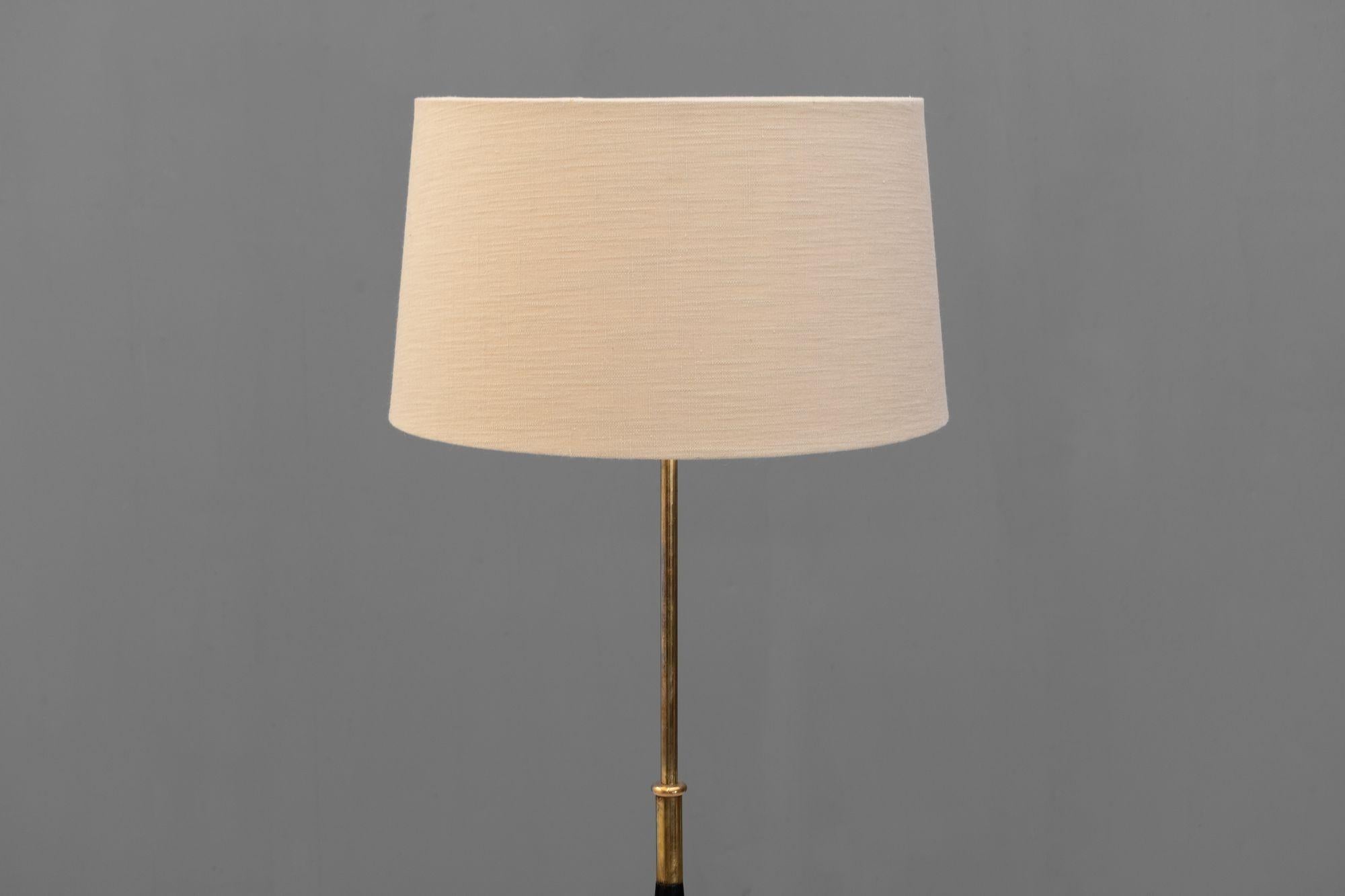 Lámpara de pie regulable de mediados de siglo mediados del siglo XX en venta