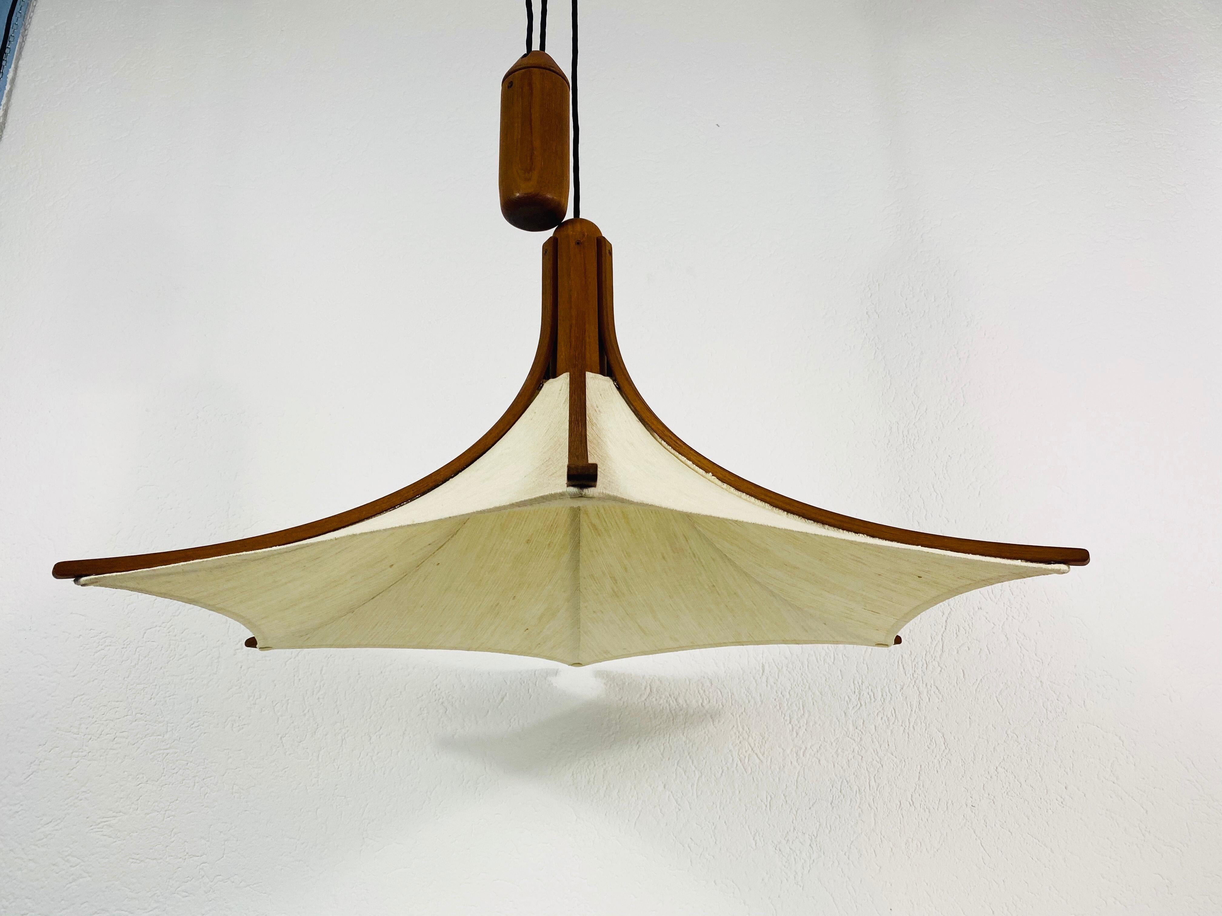 A wooden pendant lamp by Domus made in the 1960s. The body of the lamp is wood. The lamp has a Scandinavian design.

Measurements of the shade:
Height 100 cm
Diameter 90 cm

The light requires an E27 light bulb. Very good vintage condition.

Free