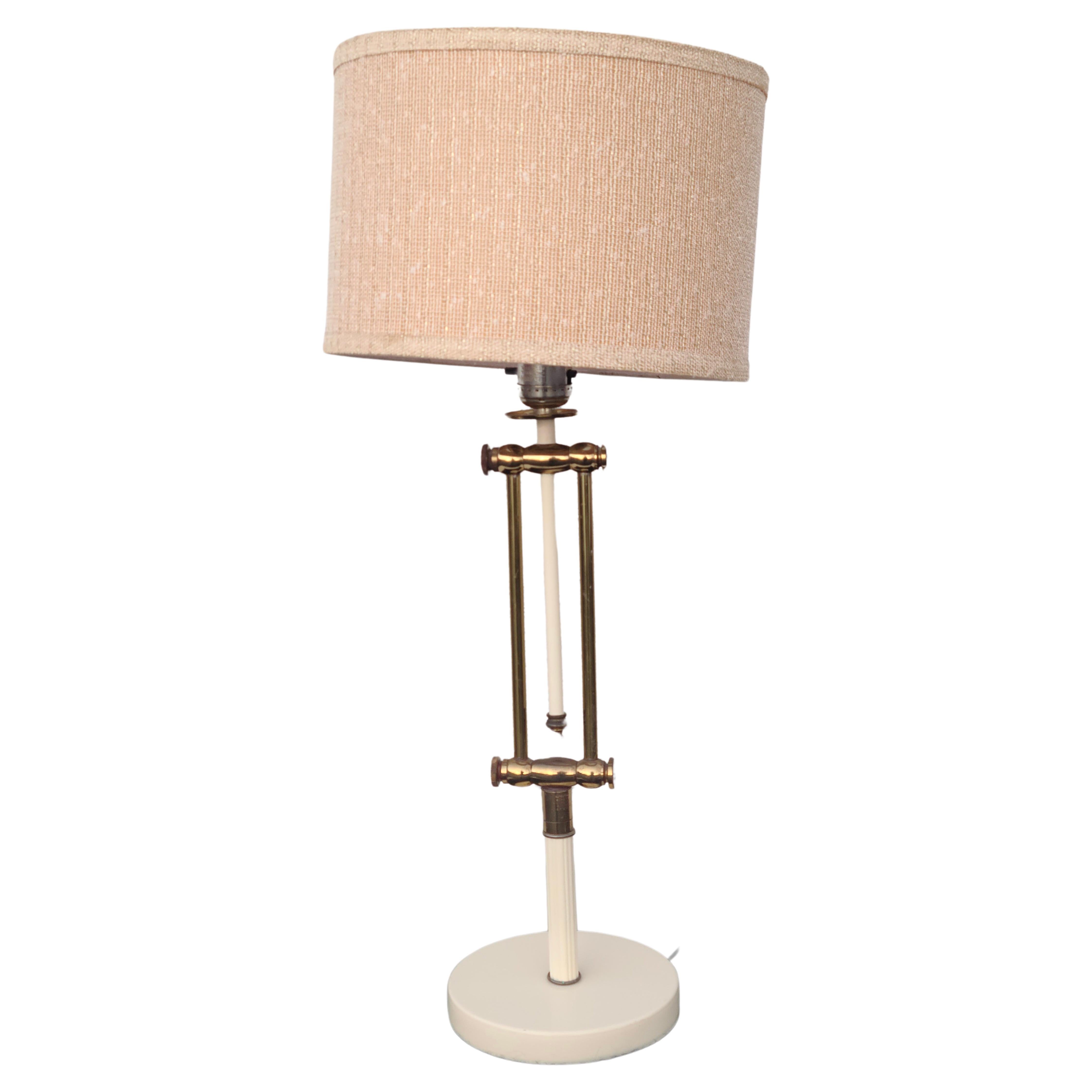 Adjustable neoclassical brass lamp by Hansen Nessen For Sale 2