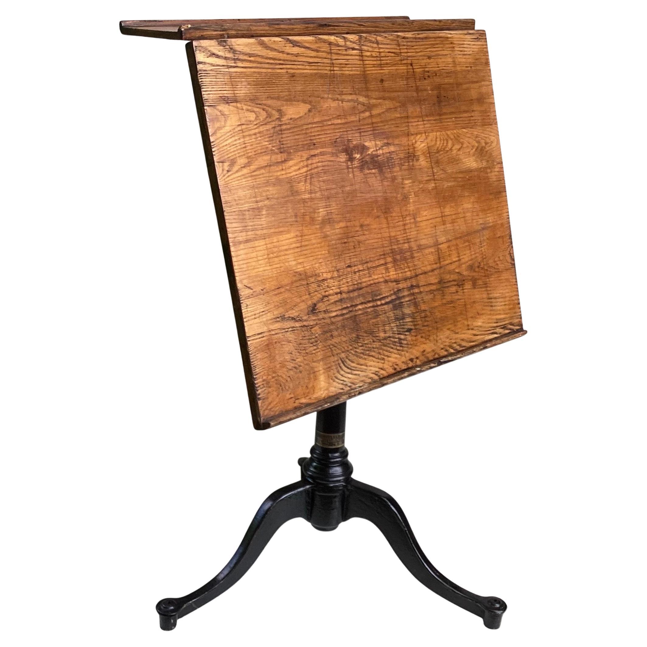 Adjustable Oak and Cast Iron Drafting Table by Keuffel & Esser Co.