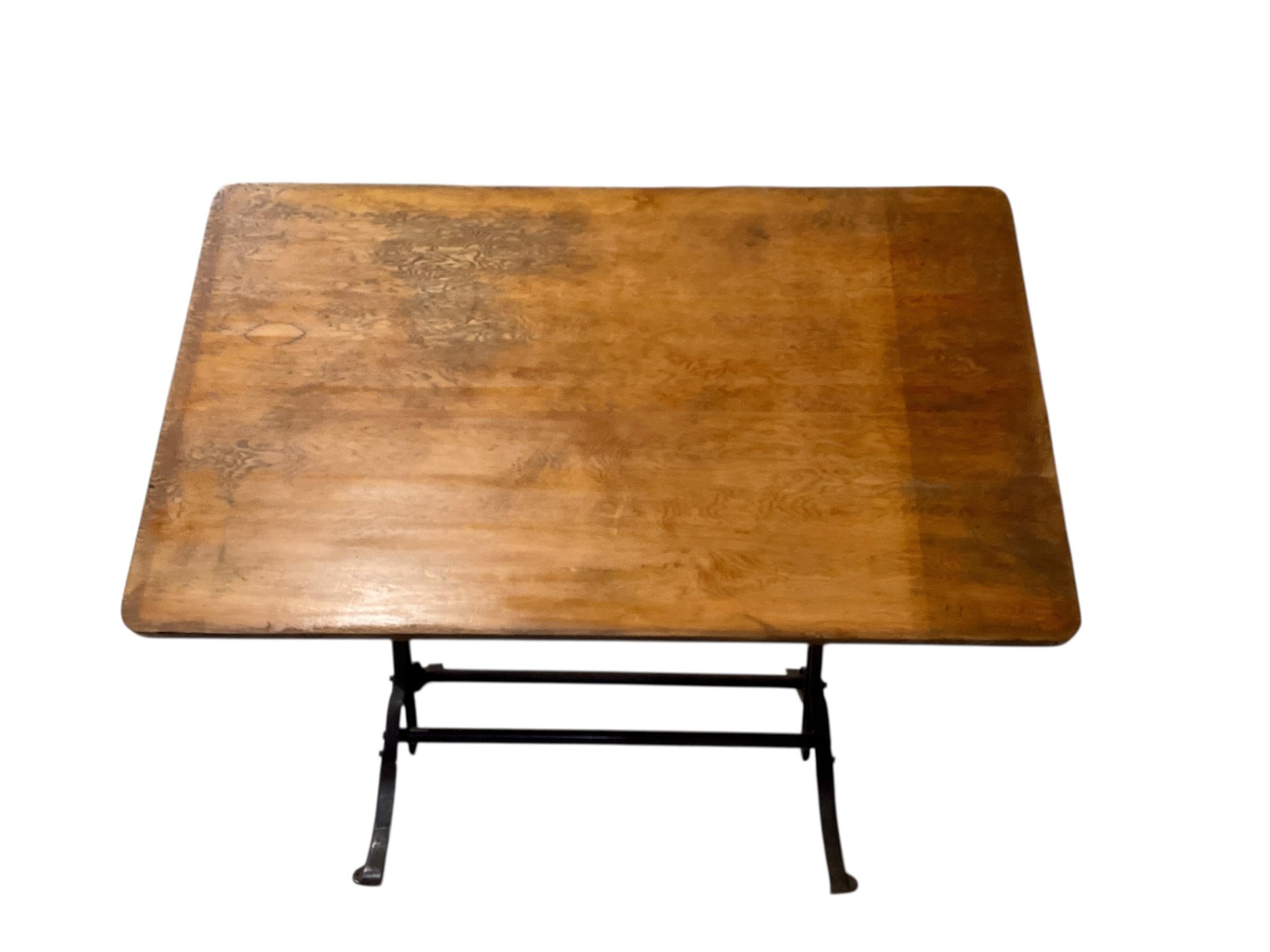 American Adjustable Oak Drafting Table With Cast Iron Base. For Sale