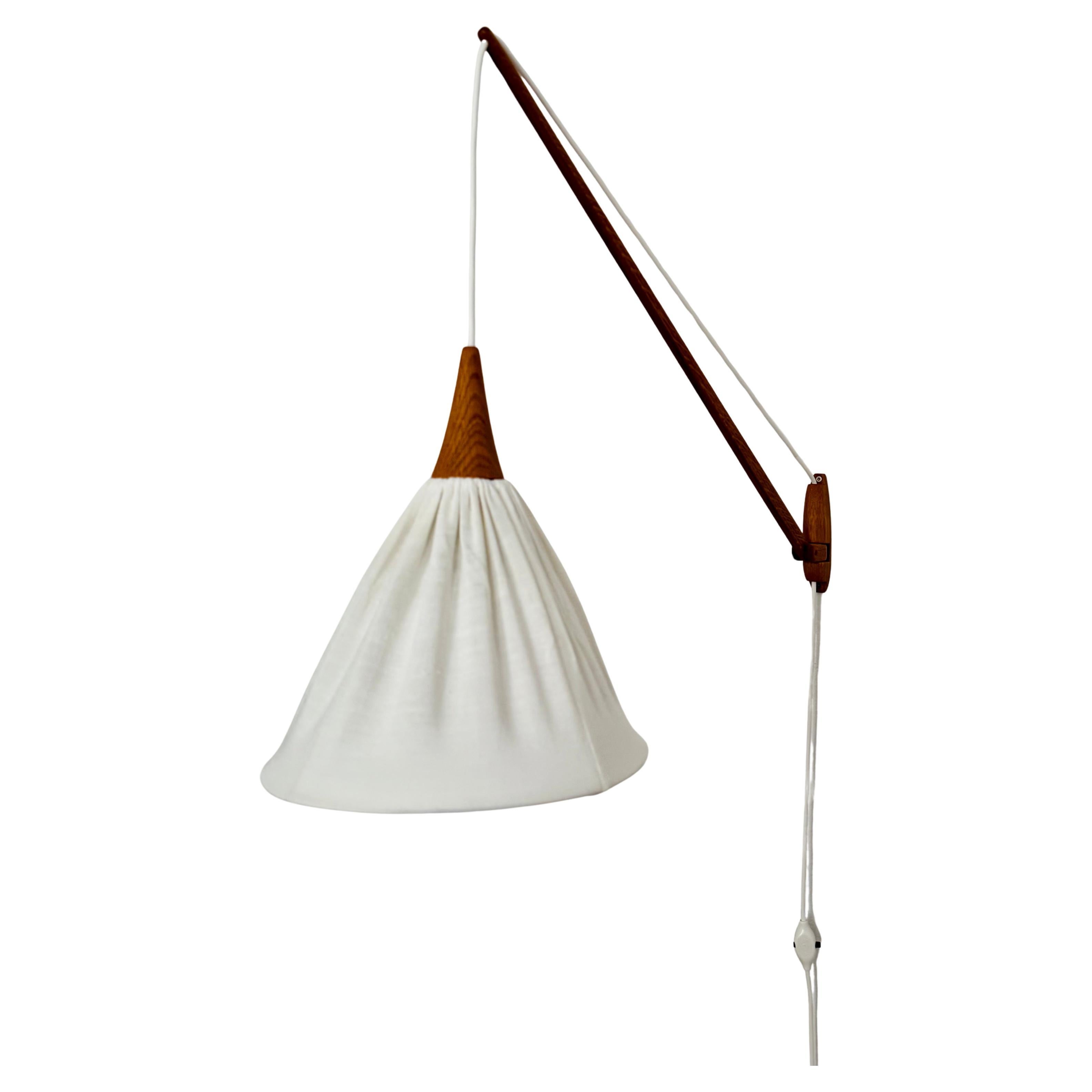 Adjustable Oak Wall Lamp by Uno and Östen Kristiansson