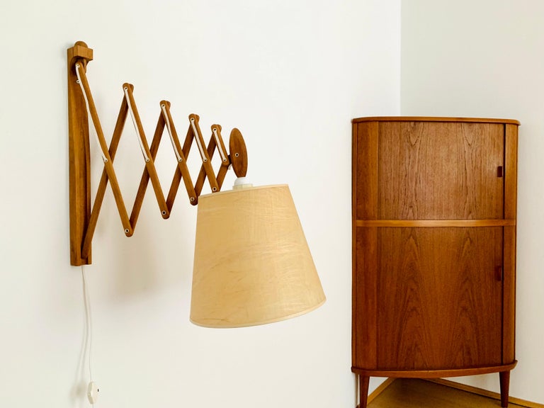 Adjustable oak wall lamp from Le Klint For Sale at 1stDibs