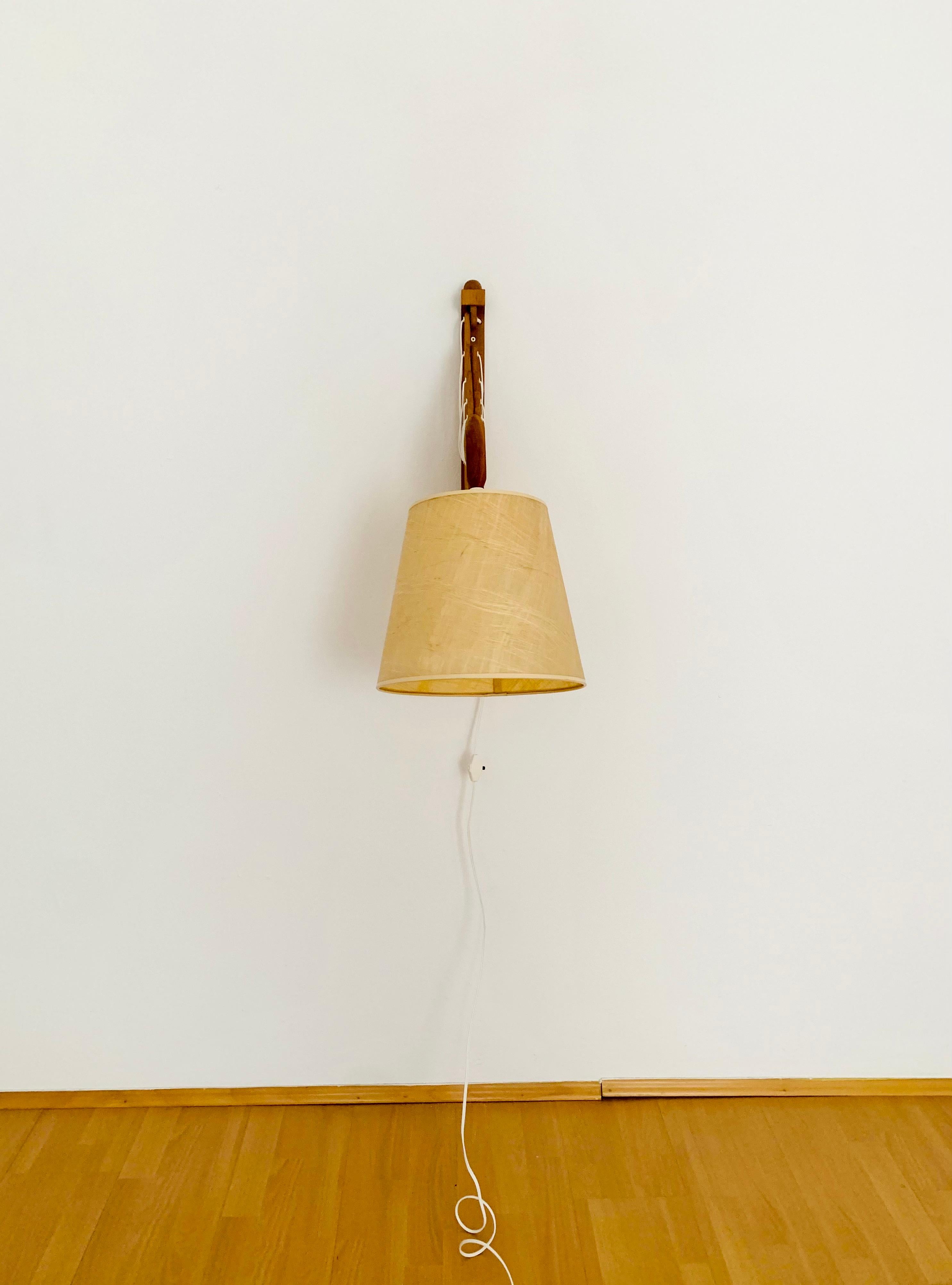 Mid-20th Century Adjustable Oak Wall Lamp from Le Klint  For Sale