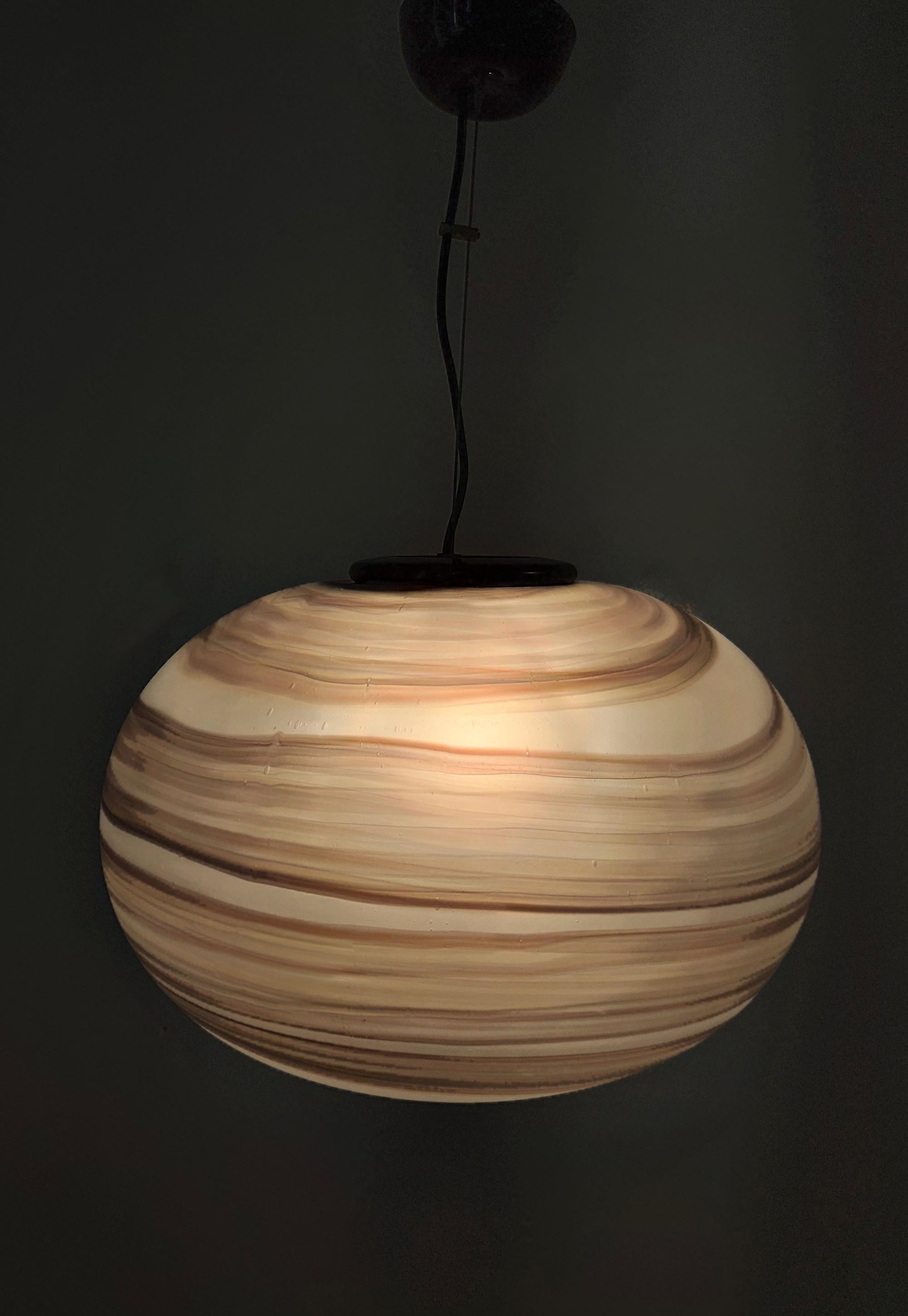 Made in Italy, 1970s - 1980s.
This pendant features and mold-blown etched glass shades with brown brush strokes. 
They are vintage pieces, therefore they might show slight traces of use, but they can be considered as in excellent original condition