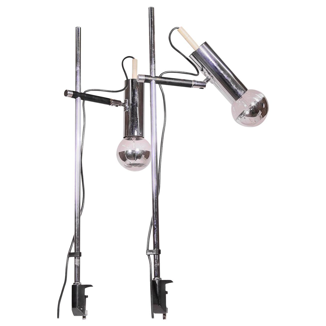 Elegant pair of adjustable clamp desk lamps made and marked by Staff Leuchten in the 1960s in Germany. 

Measures: height 29.5“ in. (75 cm), height from the edge of the table 27“ in. (69 cm). 
Lighting: takes one large Edison bulb per lamp