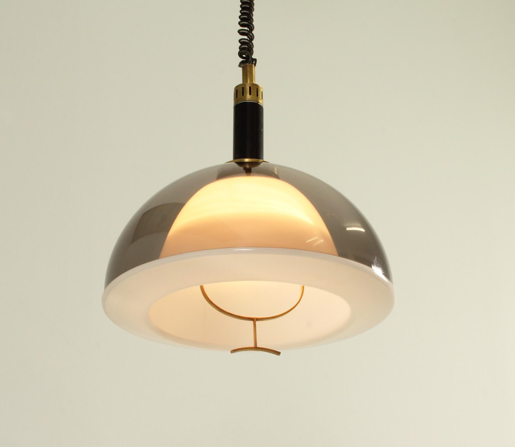 Pendant lamp produced in 1960's by Stilux Milano, Italy. Double shade with coloured plexigass and white acrylic reflector, lacquered metal and brass fittings with original extendable wire with a height from 98 to 165 cm.