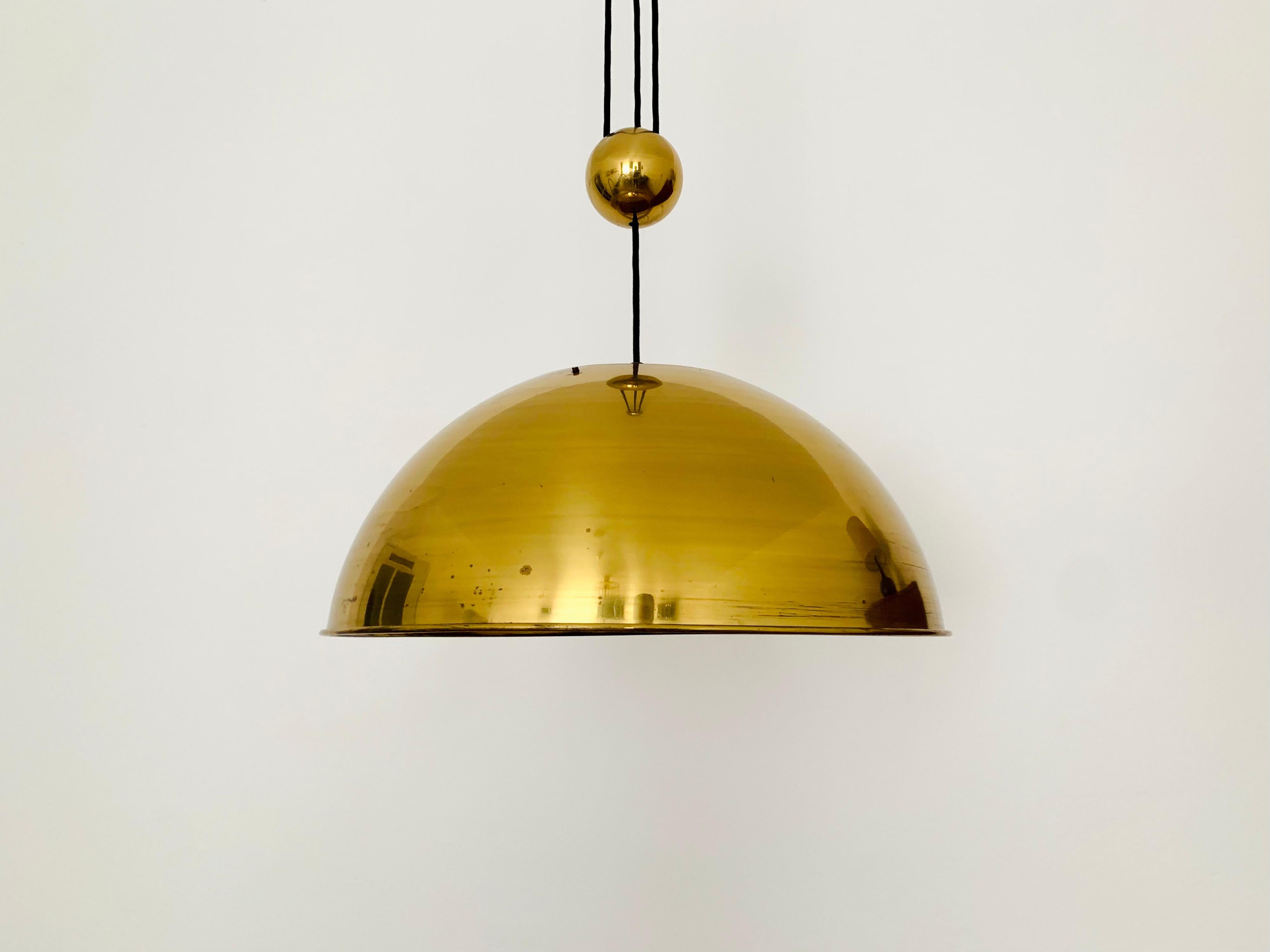 Very beautiful and rare brass ceiling lamp from the 1960s.
The lighting effect of the lamp is extremely beautiful.
The design and the very beautiful details create a very elegant and pleasant light.
The lamp creates a very cozy atmosphere and is