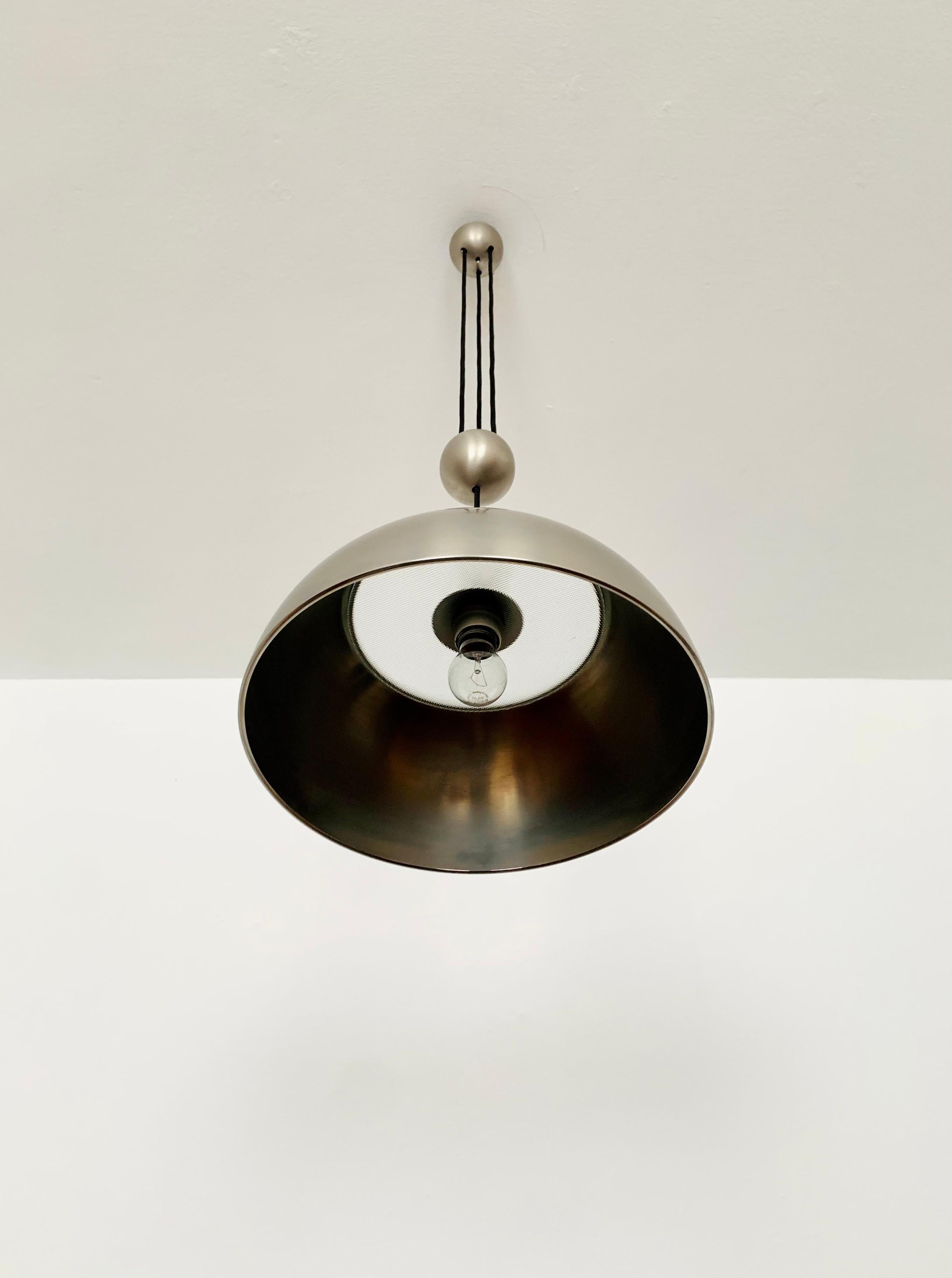 Brass Adjustable Pendant Lamp with Counterweight by Florian Schulz For Sale