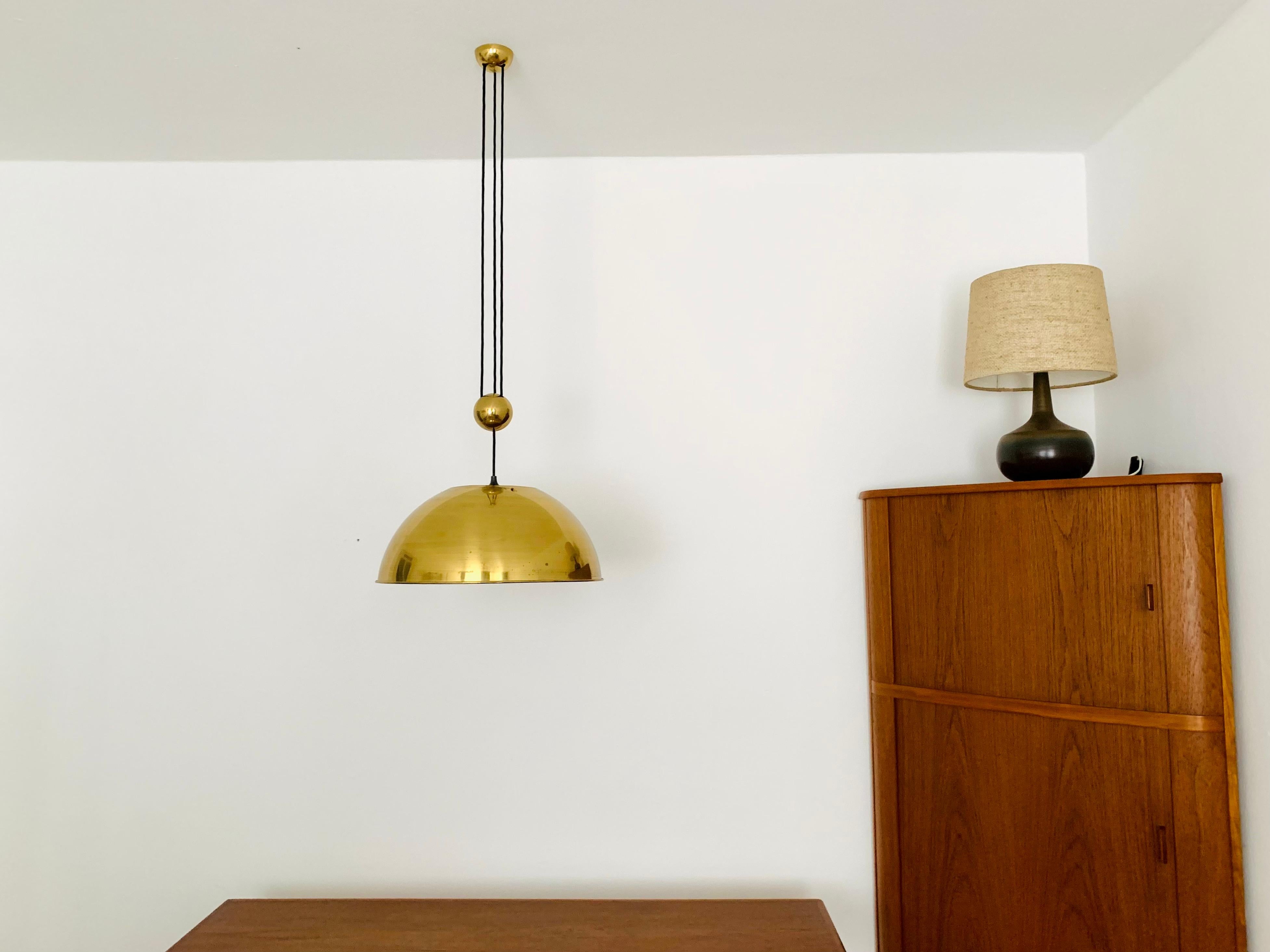 Metal Adjustable Pendant Lamp with Counterweight by Florian Schulz For Sale