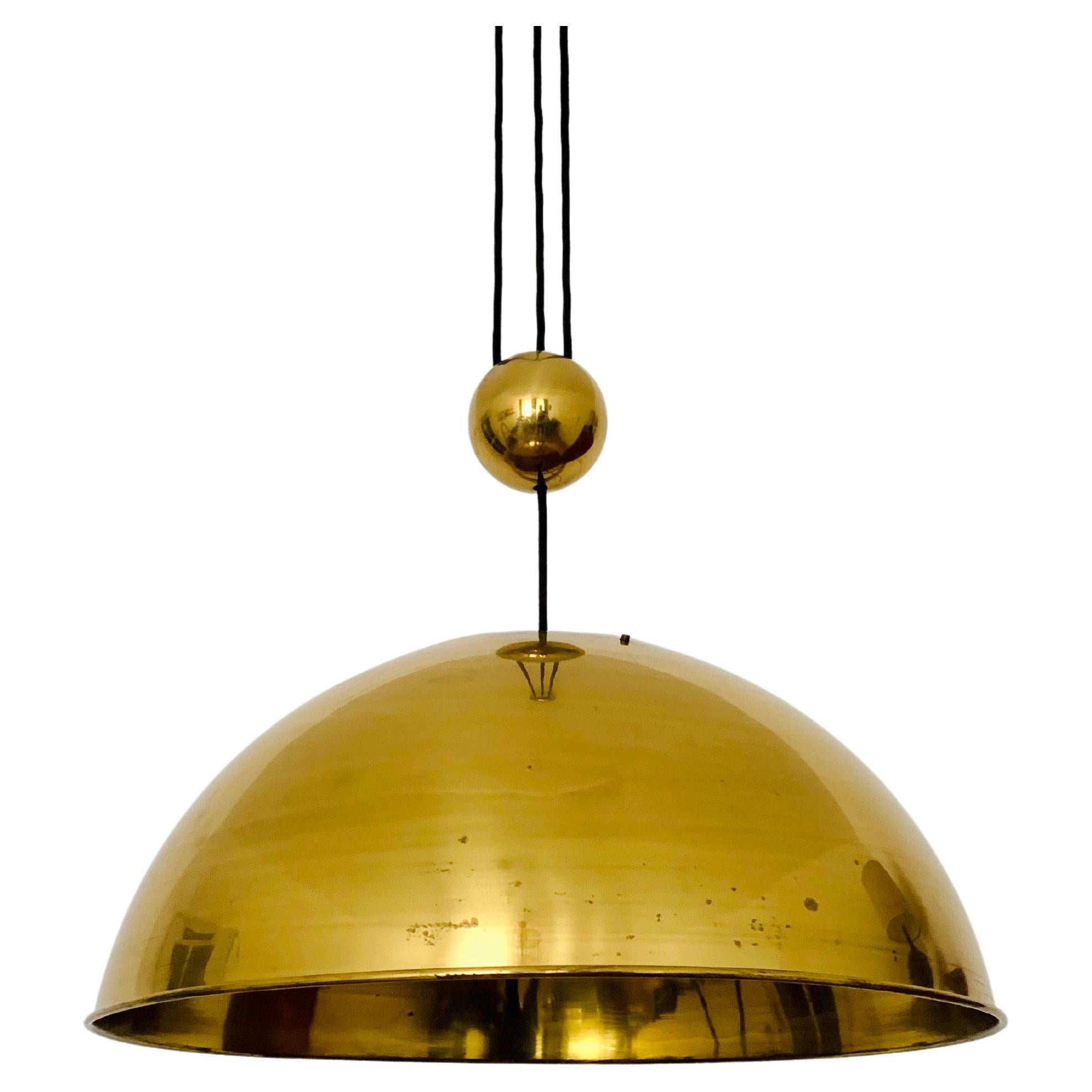 Adjustable Pendant Lamp with Counterweight by Florian Schulz