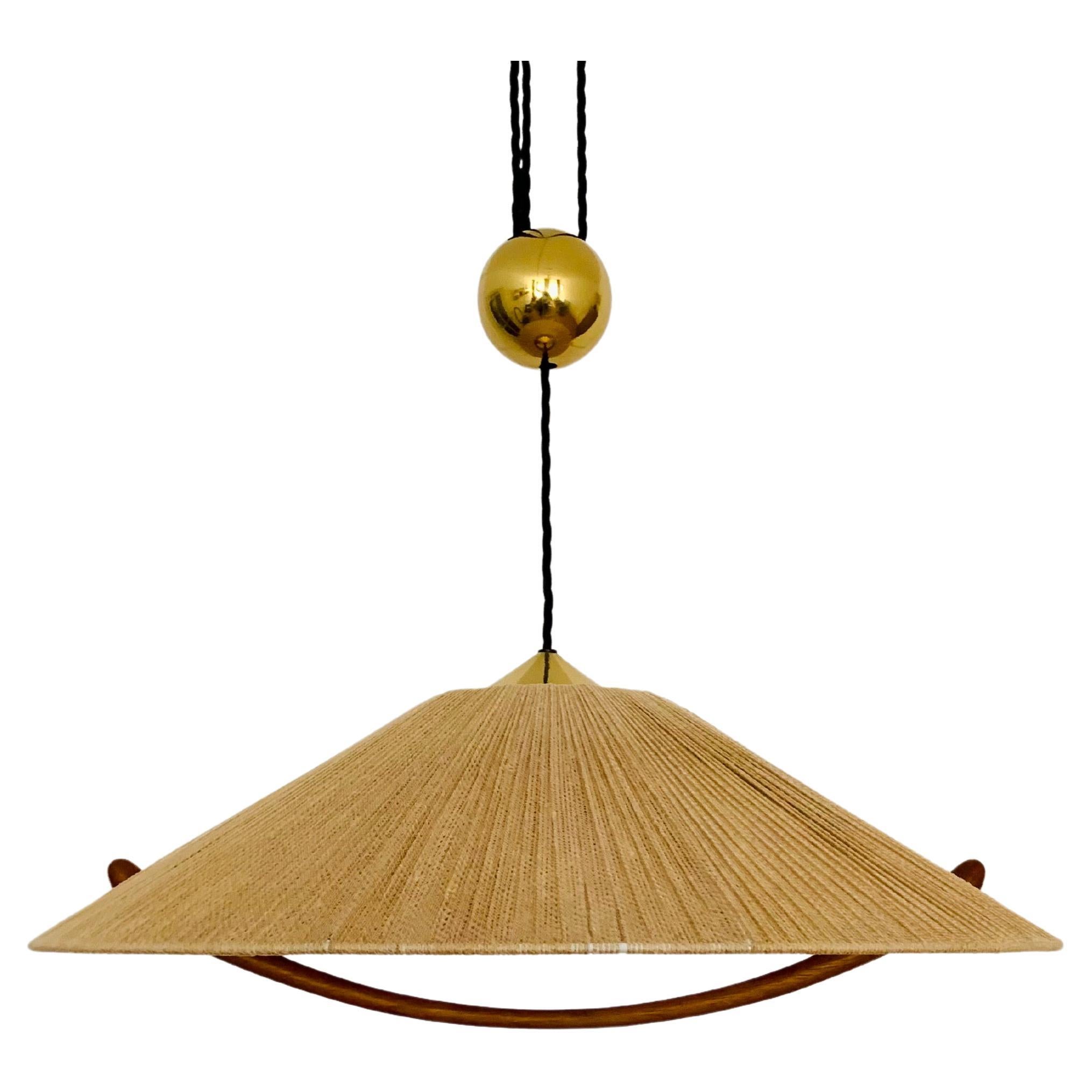 Adjustable Pendant Lamp with Counterweight by Florian Schulz