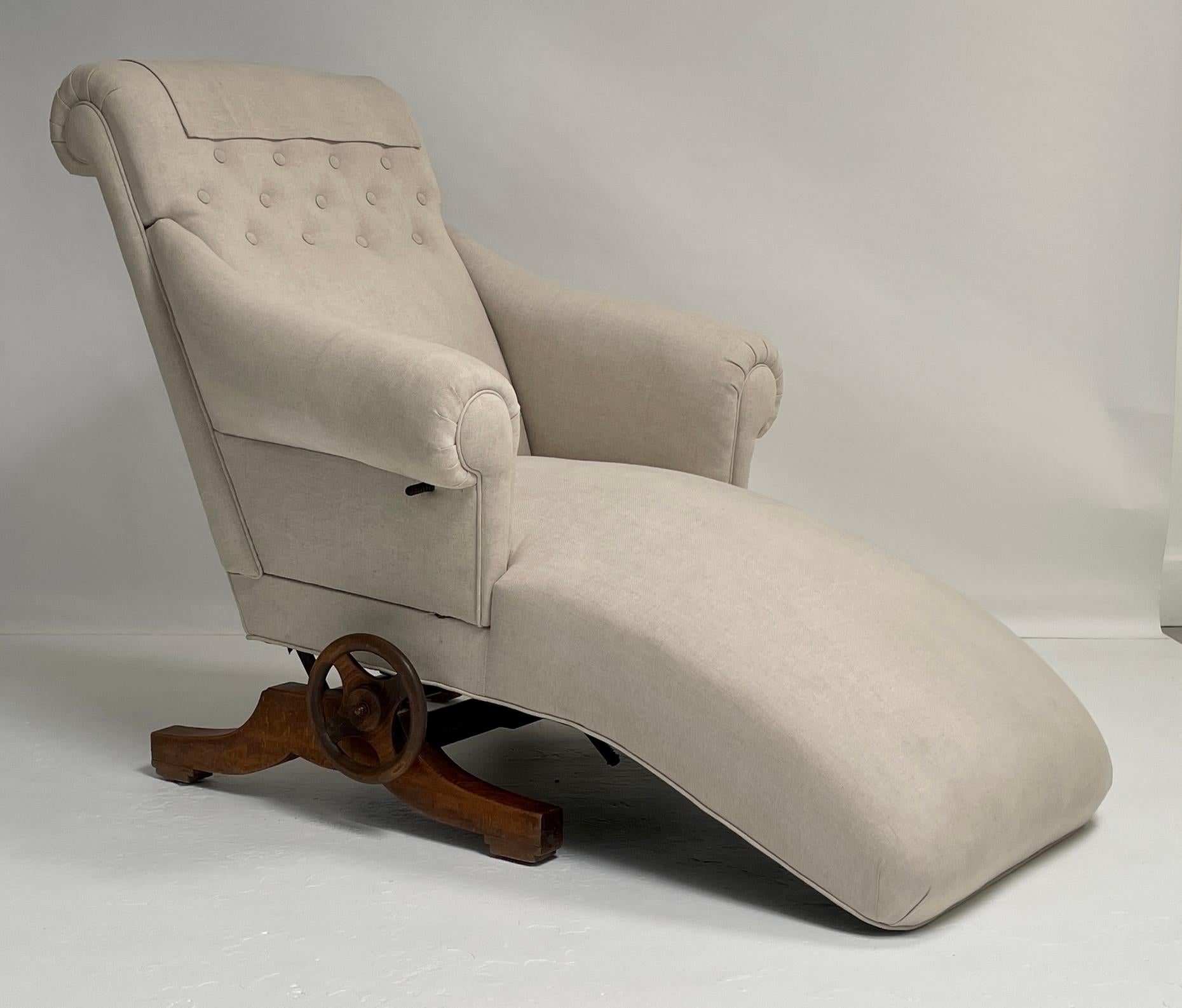 Unique find! Very comfortable reclining chaise lounge. Great vintage detailing in the mechanism to recline the seat. The arm swings out for easy access. Completely restored, newly upholstered.