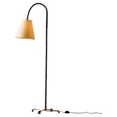 Adjustable Saddle-stitched leather floor lamp attr. to Jacques Adnet