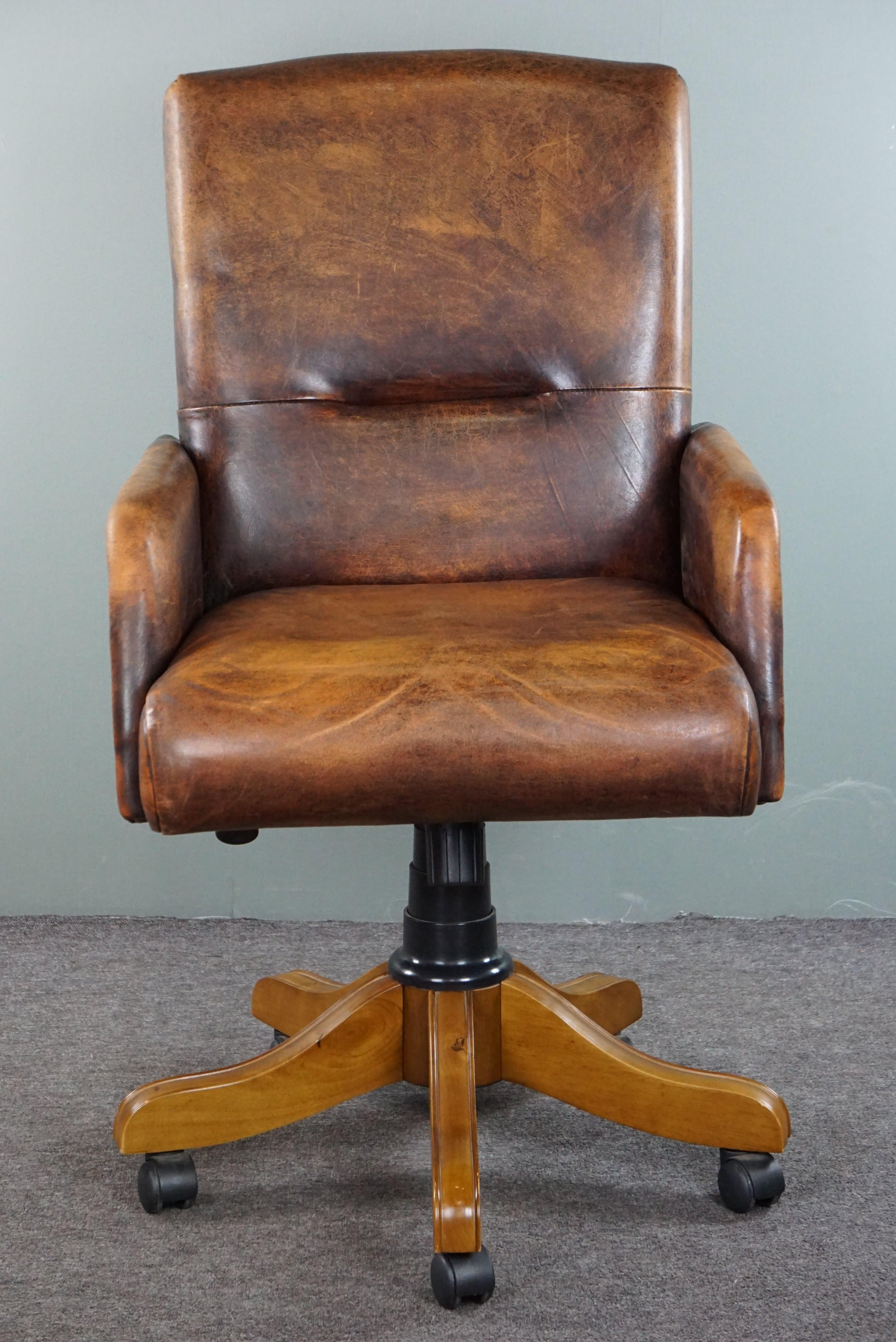 Offered is this adjustable sheepskin leather office chair in good condition, English style, with swivel and tilt function. 

Who wouldn't want this? We certainly do! Secretly, doesn't everyone dream of an English desk with a chair like