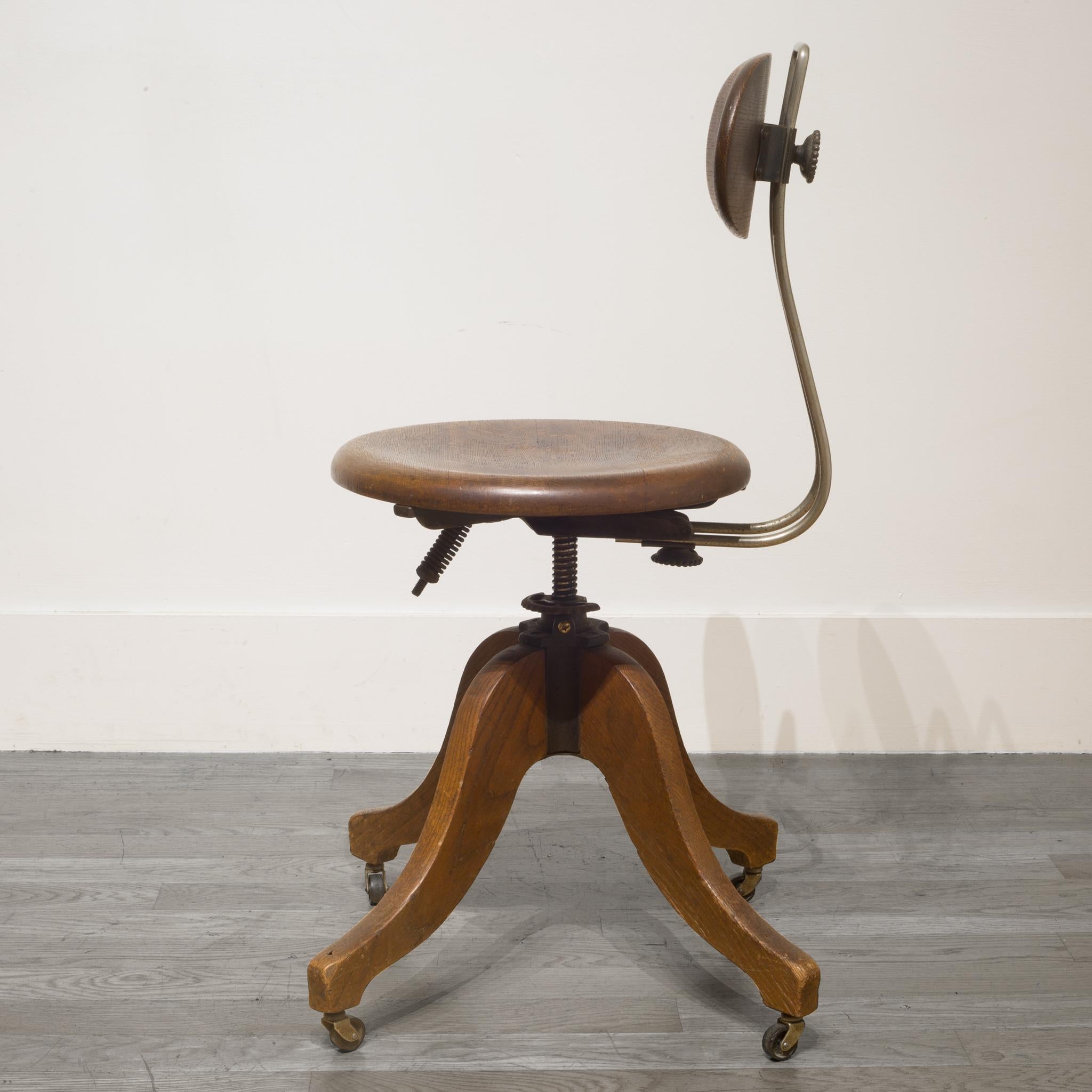 Adjule Solid Oak Cast Iron Swivel Desk Chair Circa 1930