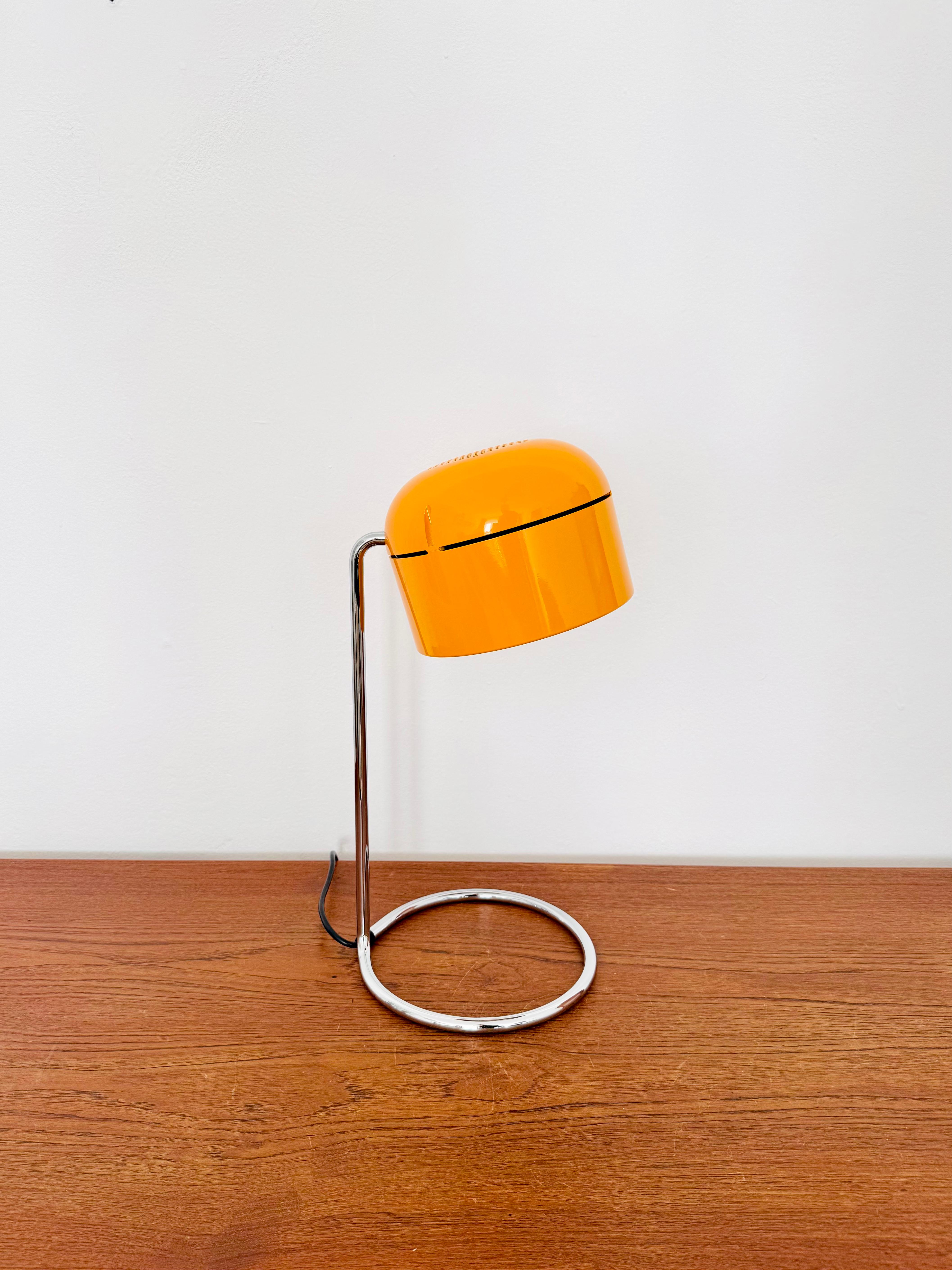 Fantastic table lamp from the 1970s.
The Staff brand is known for its high-quality workmanship and perfectionist design.
The large lamp head is infinitely adjustable.
The mirror reflector creates a concentrated light for targeted