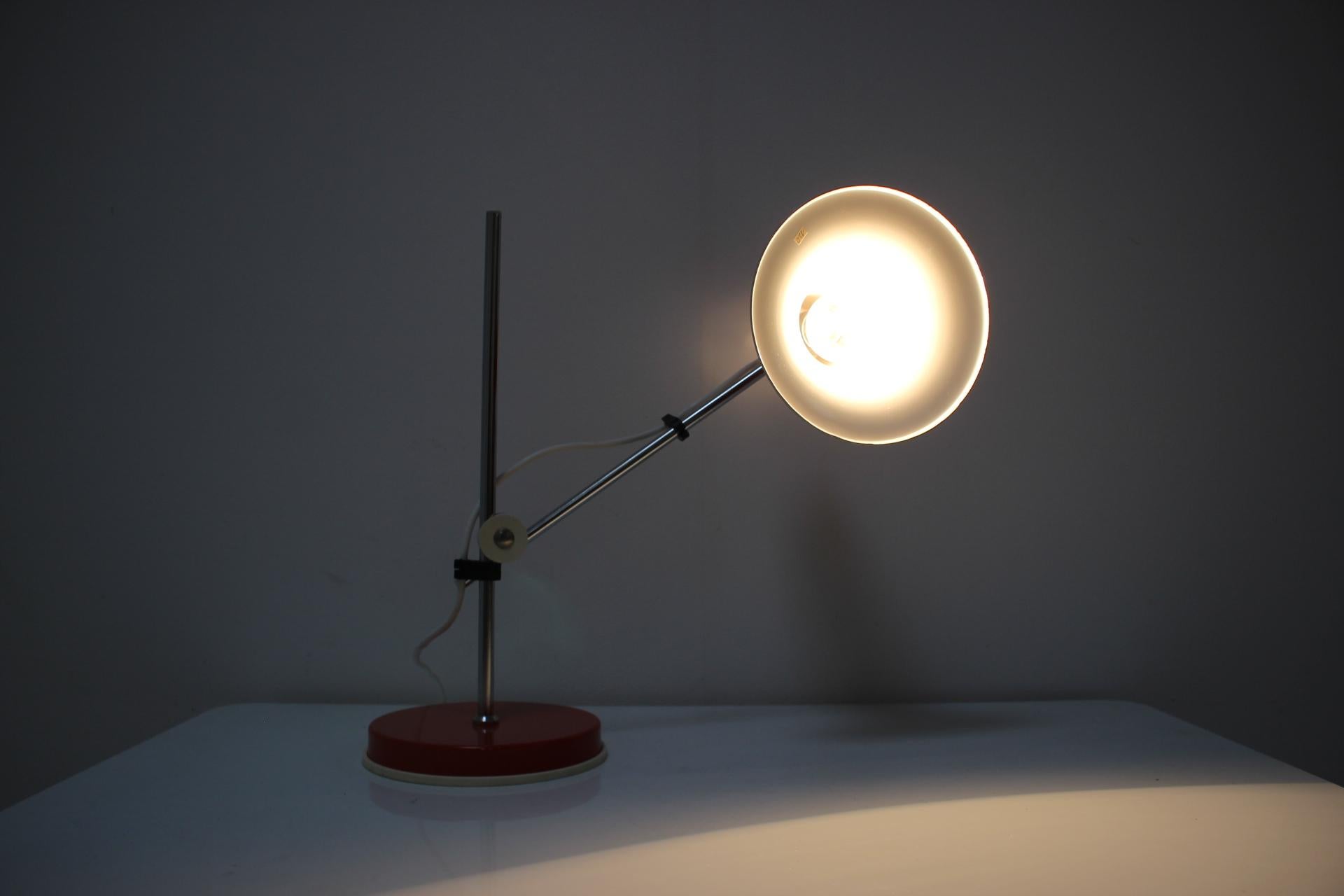 Adjustable table lamp from the 1970's, made in Hungary.
Made of metal and chrome.
Fully functional, in original condition.
Repolished, cleaned, ready to be used.
A few minor signs of wear.
