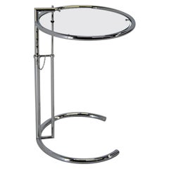 Adjustable Table E 1027 in Chrome and Crystal by Eileen Gray