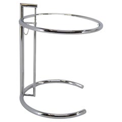 Adjustable Table E 1027 in Chrome and Crystal by Eileen Gray