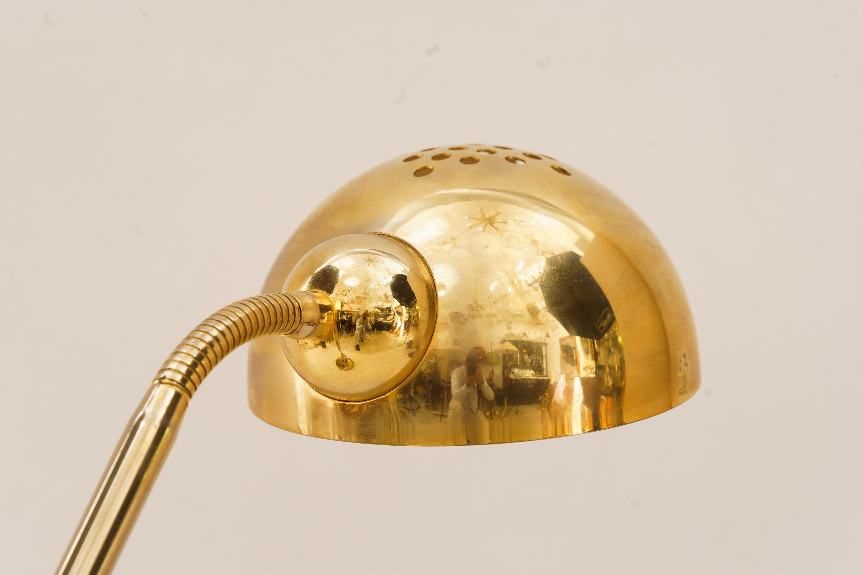 Brass Adjustable Table lamp by vrieland design made in Holland around 1980s For Sale