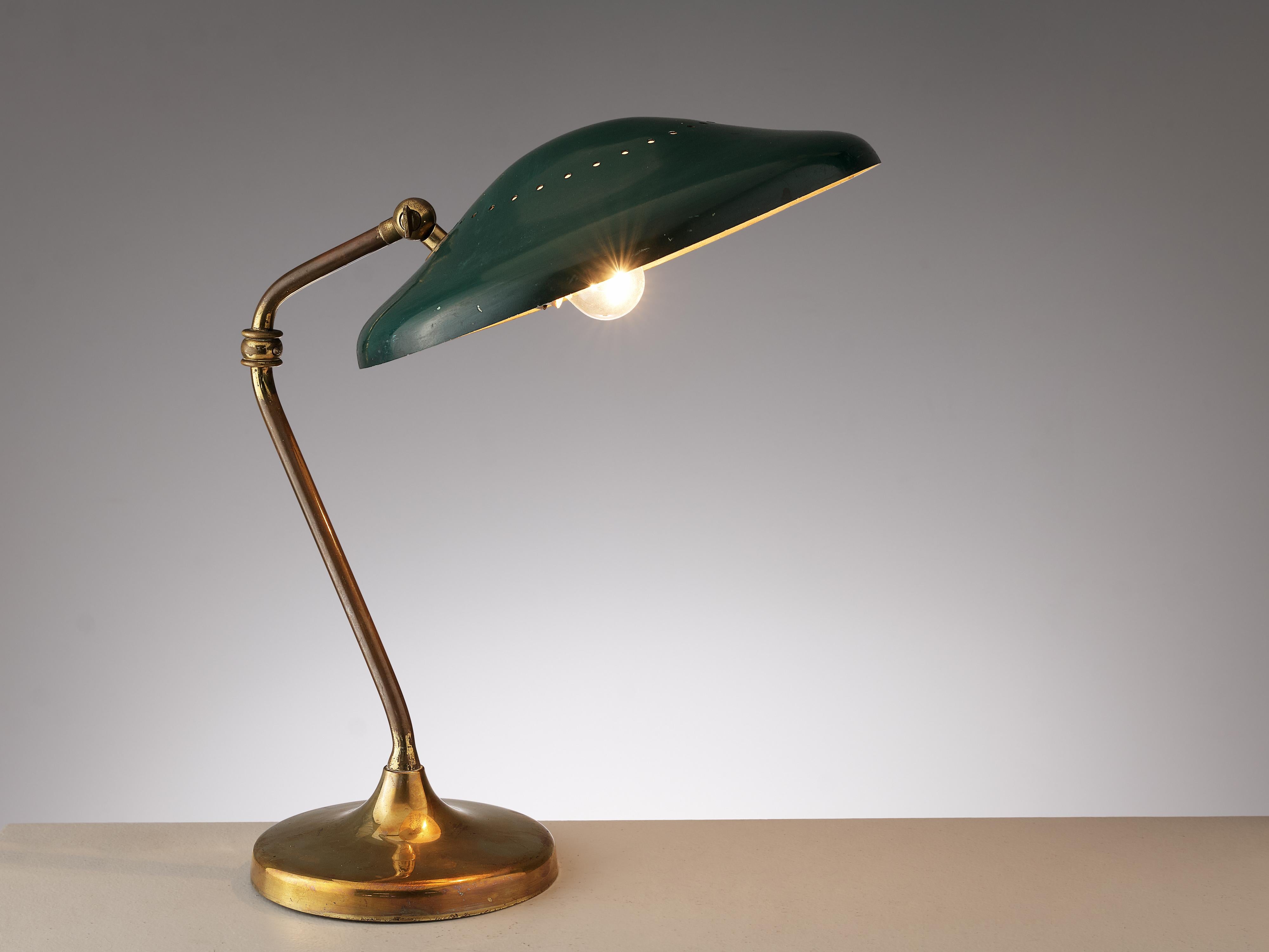 Table lamp, brass, metal, Europe, 1960s

A functional design with a sophisticated look, this table lamp is ideal for working environments. The green coated shade is decorated with small perforations through which the light shines in a fine manner.