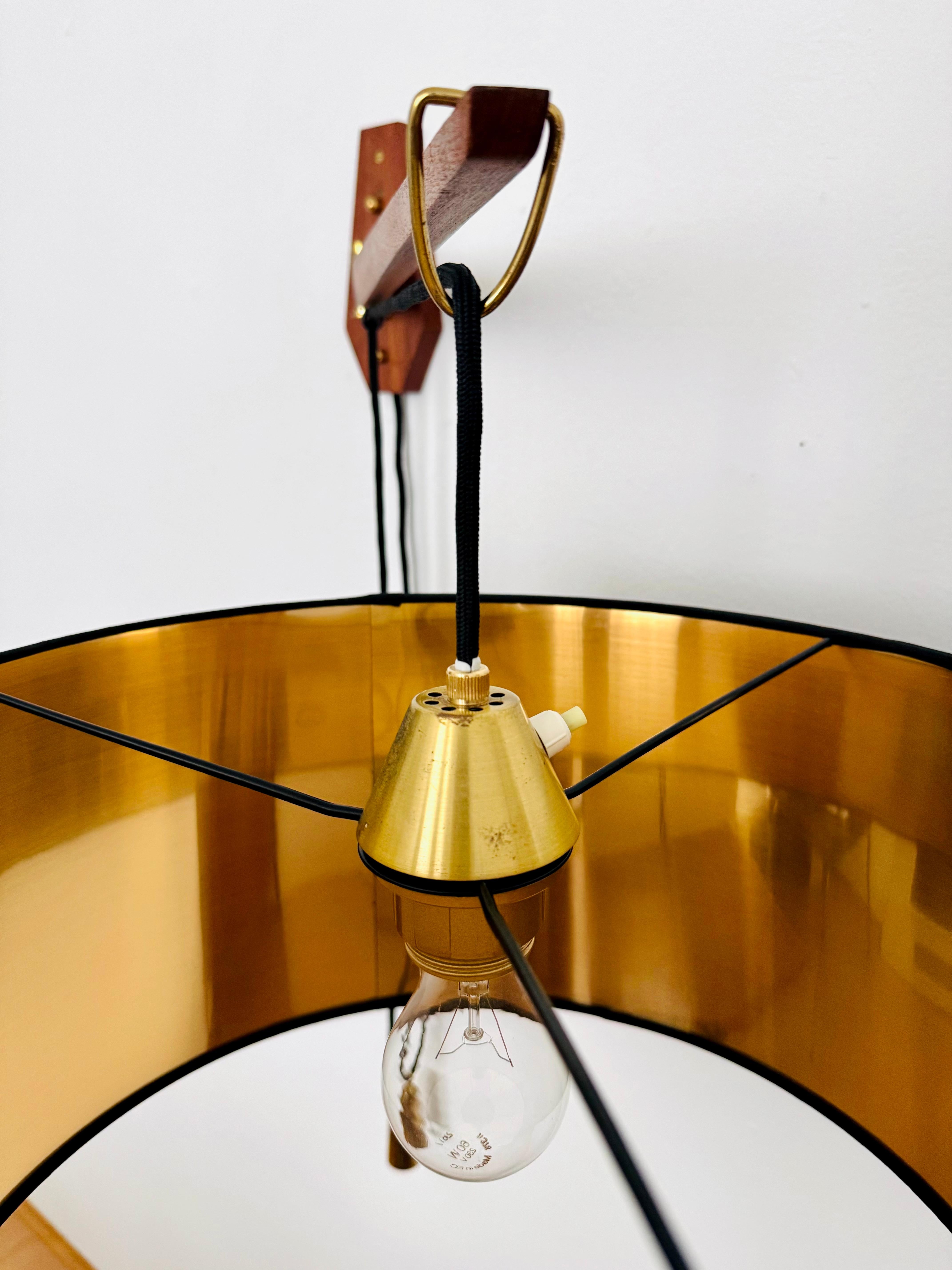 Adjustable Teak Wall Lamp by Kaiser Leuchten For Sale 7