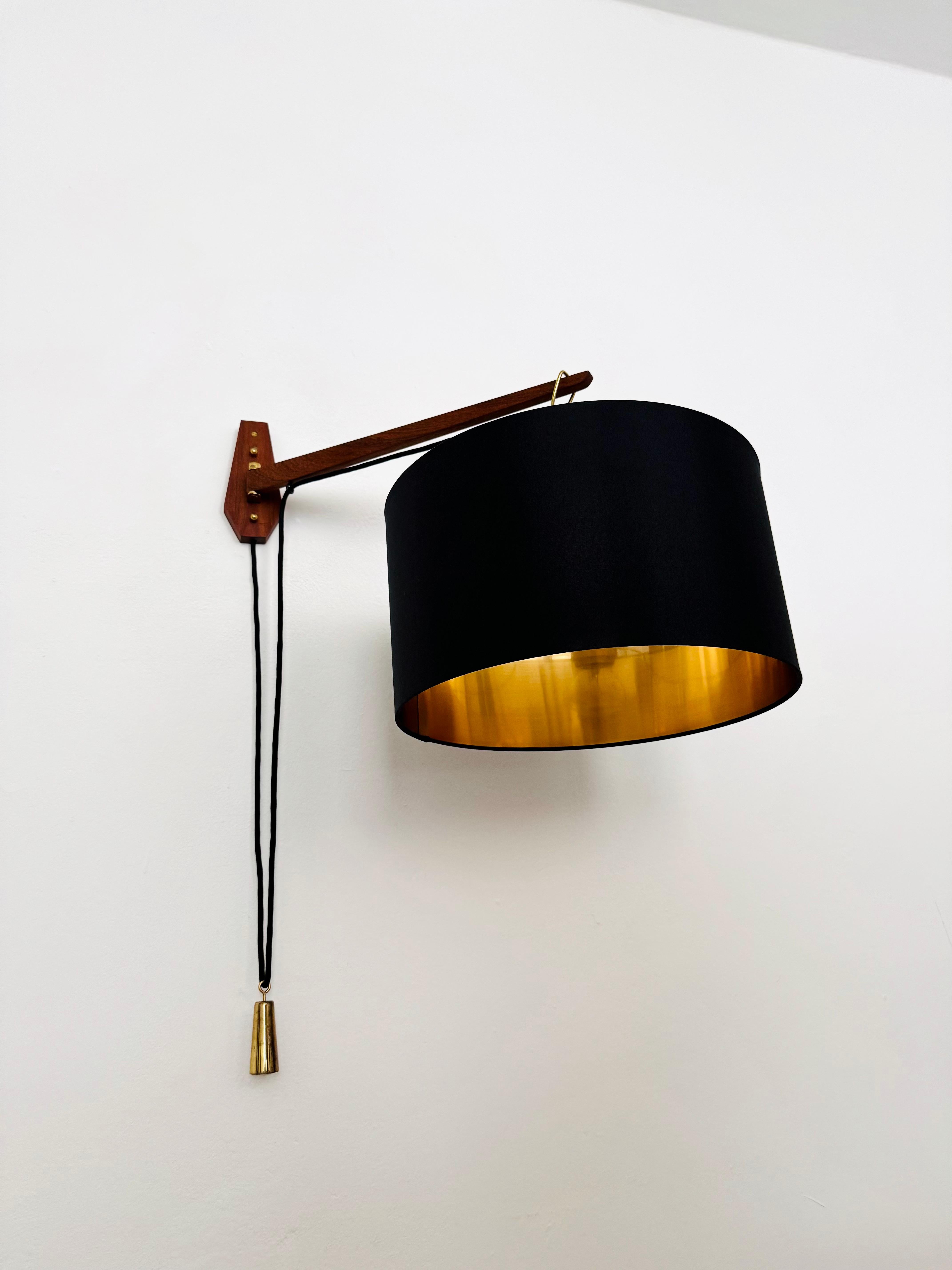 German Adjustable Teak Wall Lamp by Kaiser Leuchten For Sale