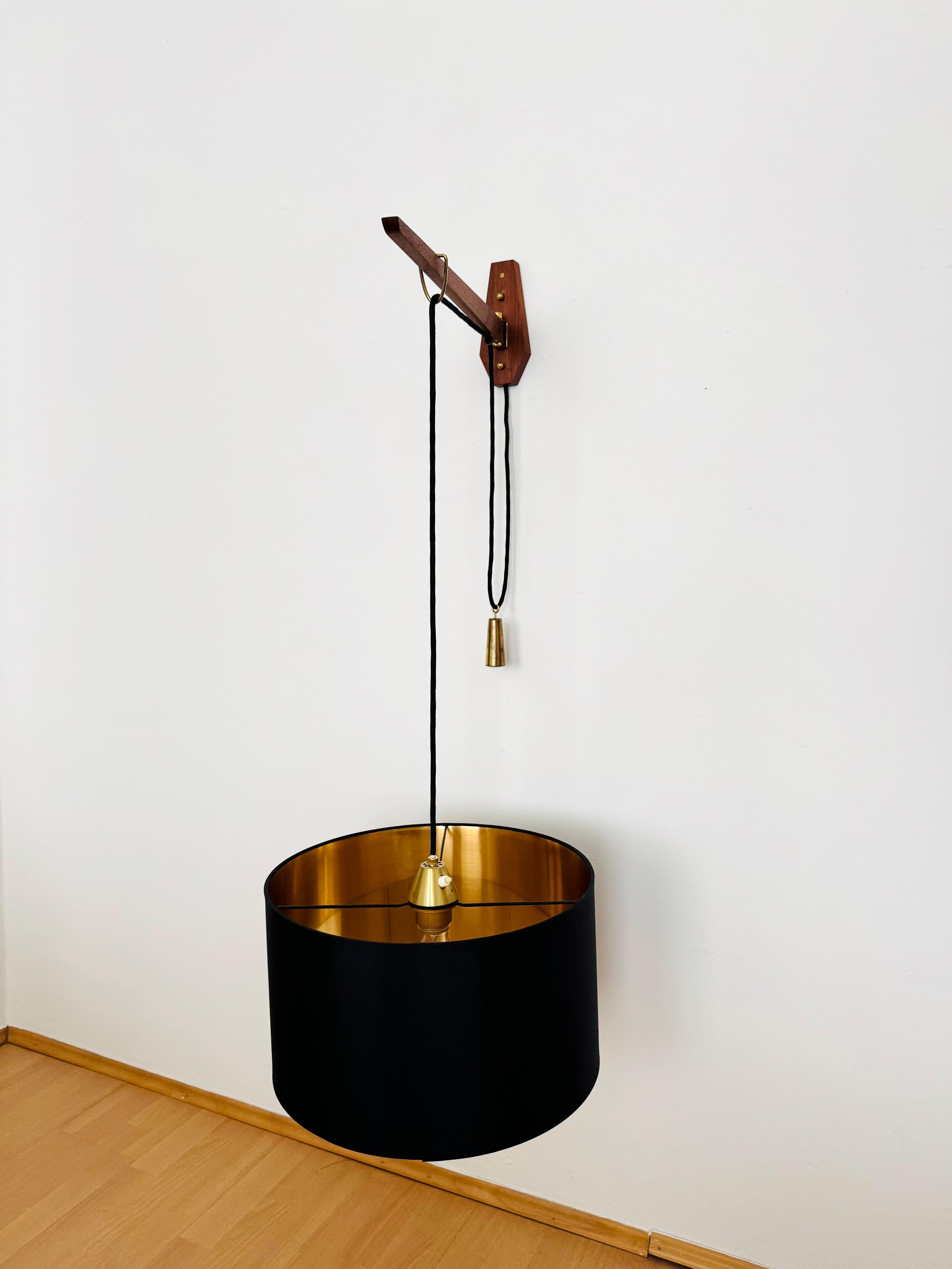 Mid-20th Century Adjustable Teak Wall Lamp by Kaiser Leuchten For Sale
