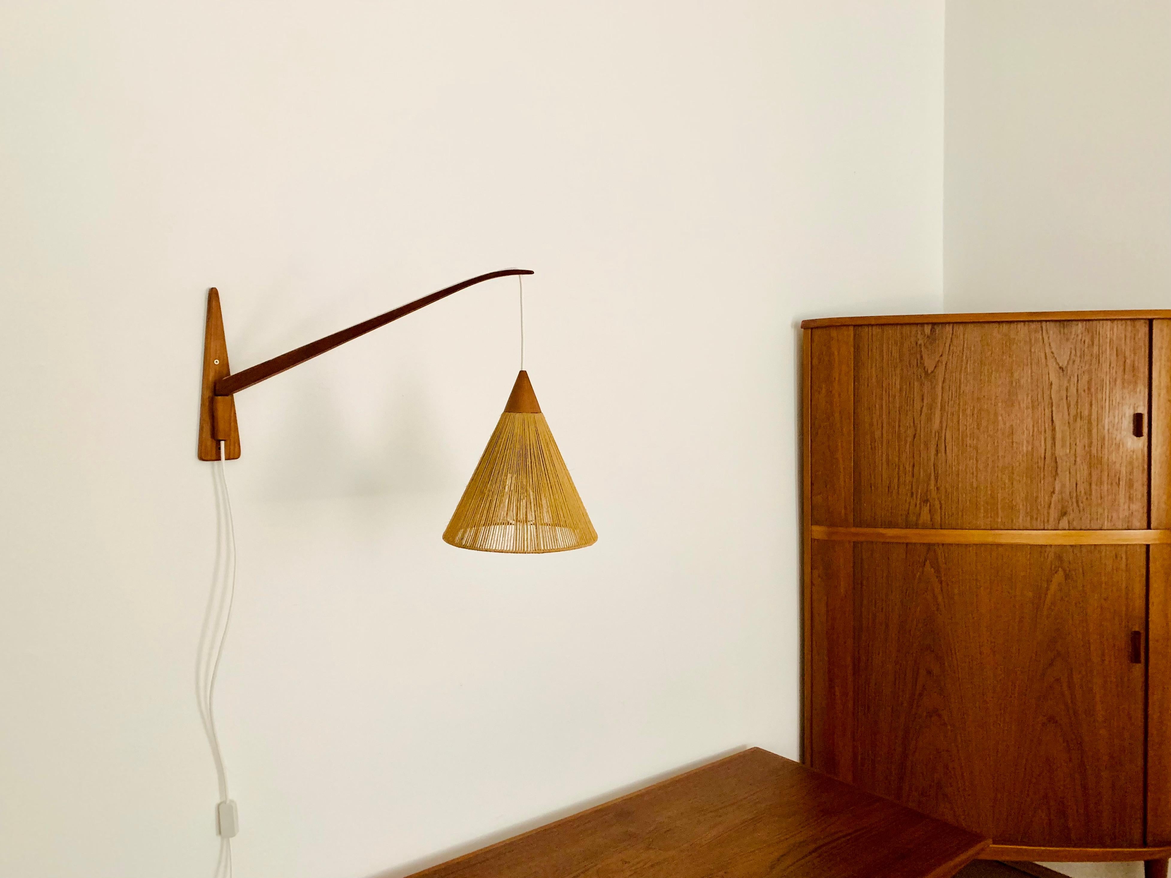 Mid-Century Modern Adjustable Teak Wall Lamp by Temde For Sale