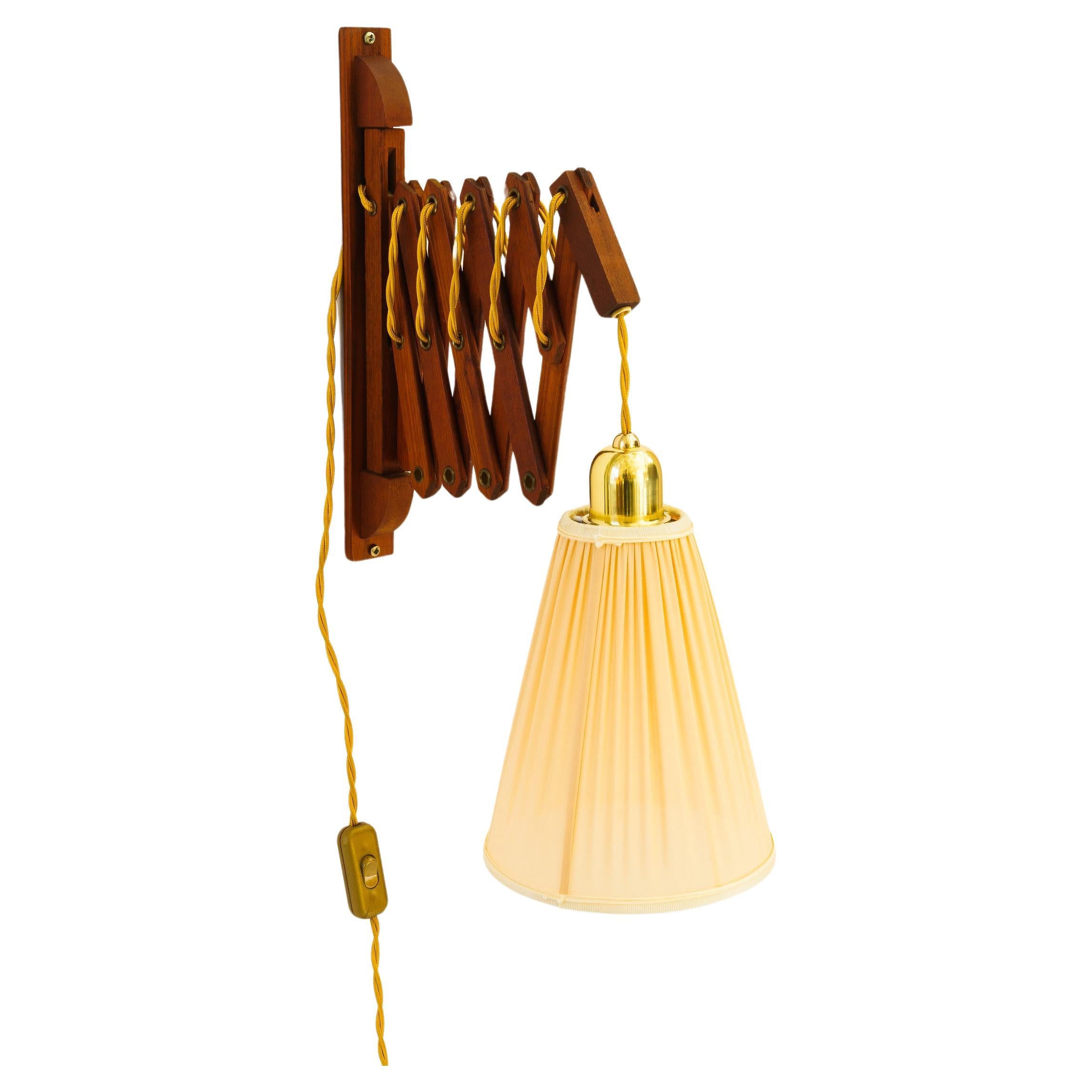 Adjustable teakwood wall lamp with fabric shade denmark around 1960s For Sale
