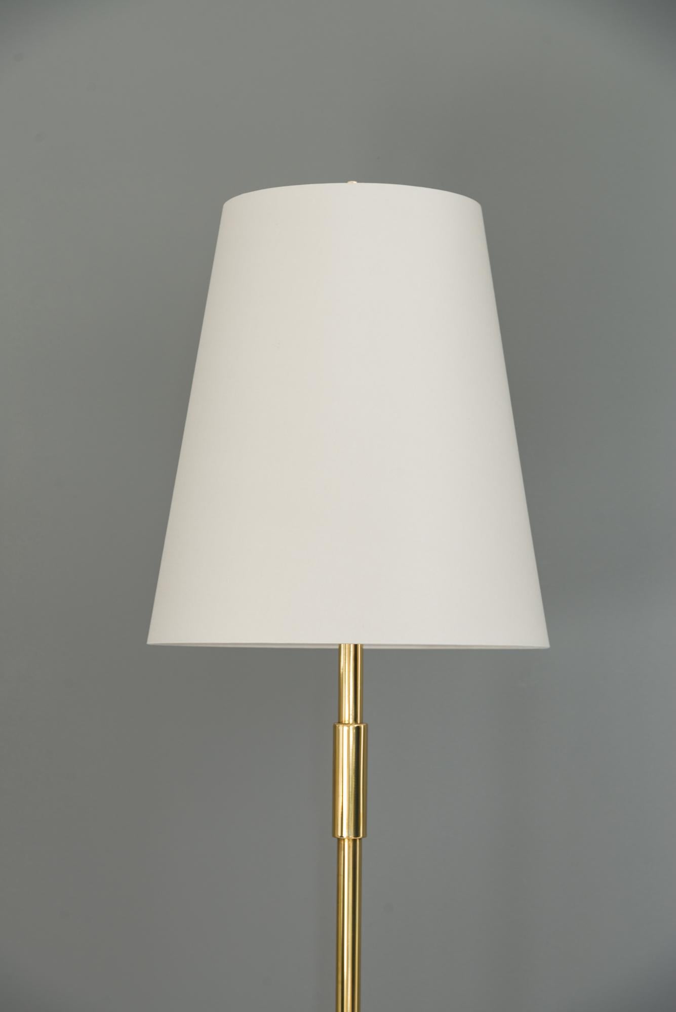 Adjustable Viennese floor lamp circa 1950s
Brass polished and stove enameled
The shade is replaced ( new )
Meaures: High adjustable from 170cm - to 190cm.