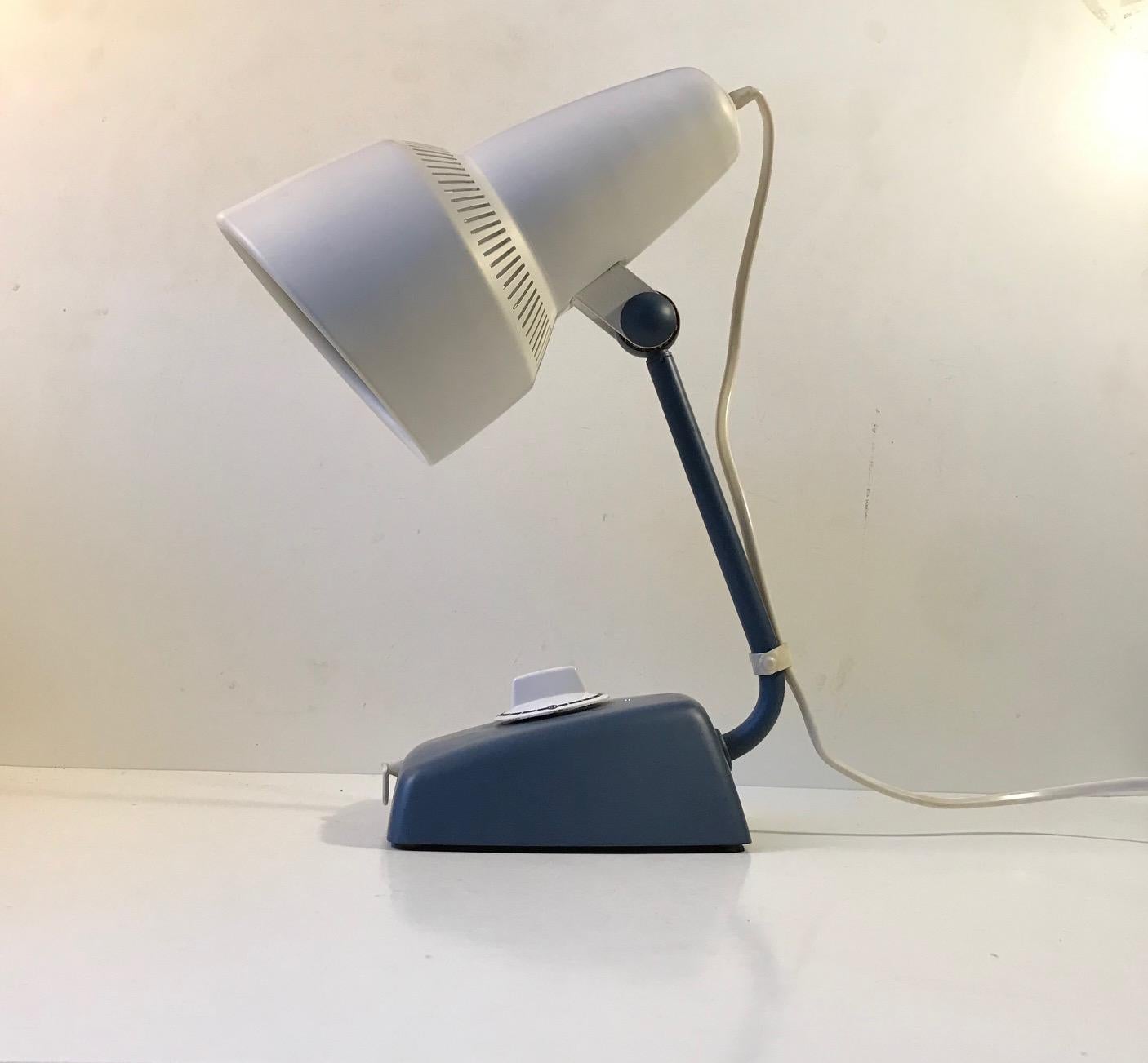 Stylish midcentury table lamp from Dutch Philips. Originally it was designed as a health - infrared heater. It still has all the features: timer, emergency switch etc but it has been converted to a regular table lamp with a 75 watt lightbulb. There