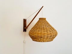 Lámpara de pared de mimbre regulable