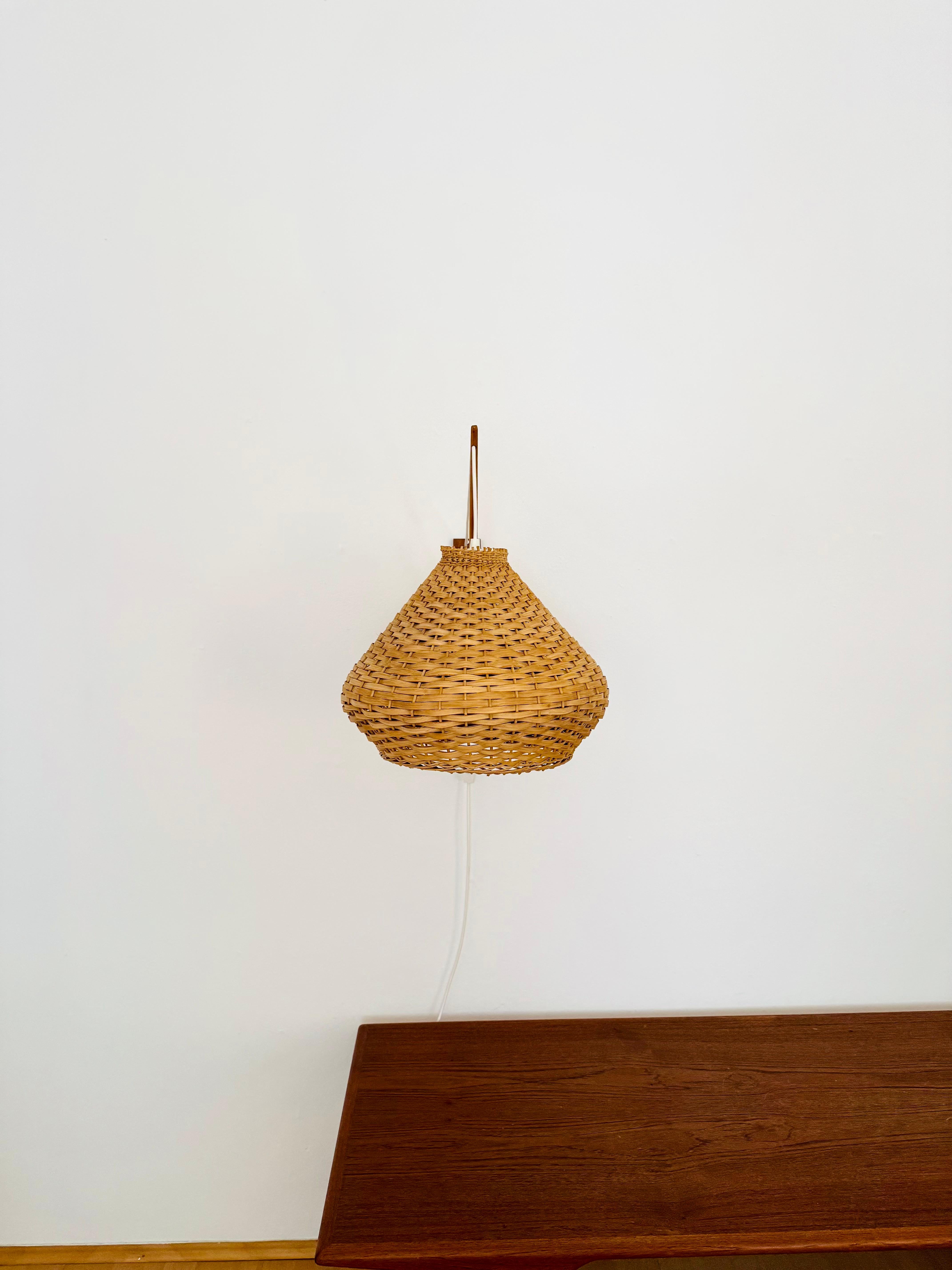 German Adjustable Wicker Wall Lamp For Sale