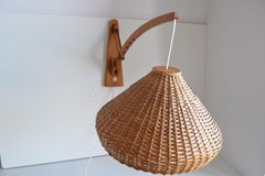 Adjustable wooden wall lamp 1960s by Pokrok Žilina, Czechoslovakia.