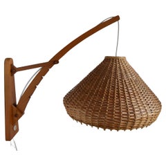 Adjustable wooden wall lamp 1960s by Pokrok Žilina, Czechoslovakia.