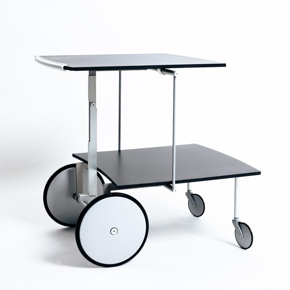 Raul Barbieri and Giorgio Marianelli are award winning Italian industrial designers and architects. They have worked together for many years creating elegant and functional pieces such as this unique Convertible Trolley / Coffee Table for Ycami in