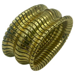 Adler 18k gold flexible bangle